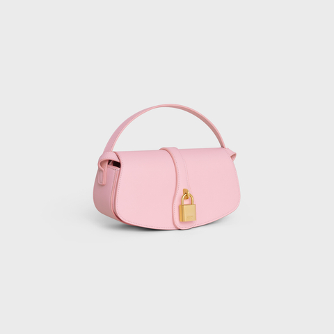 CLUTCH ON STRAP TABOU IN SMOOTH CALFSKIN PINK