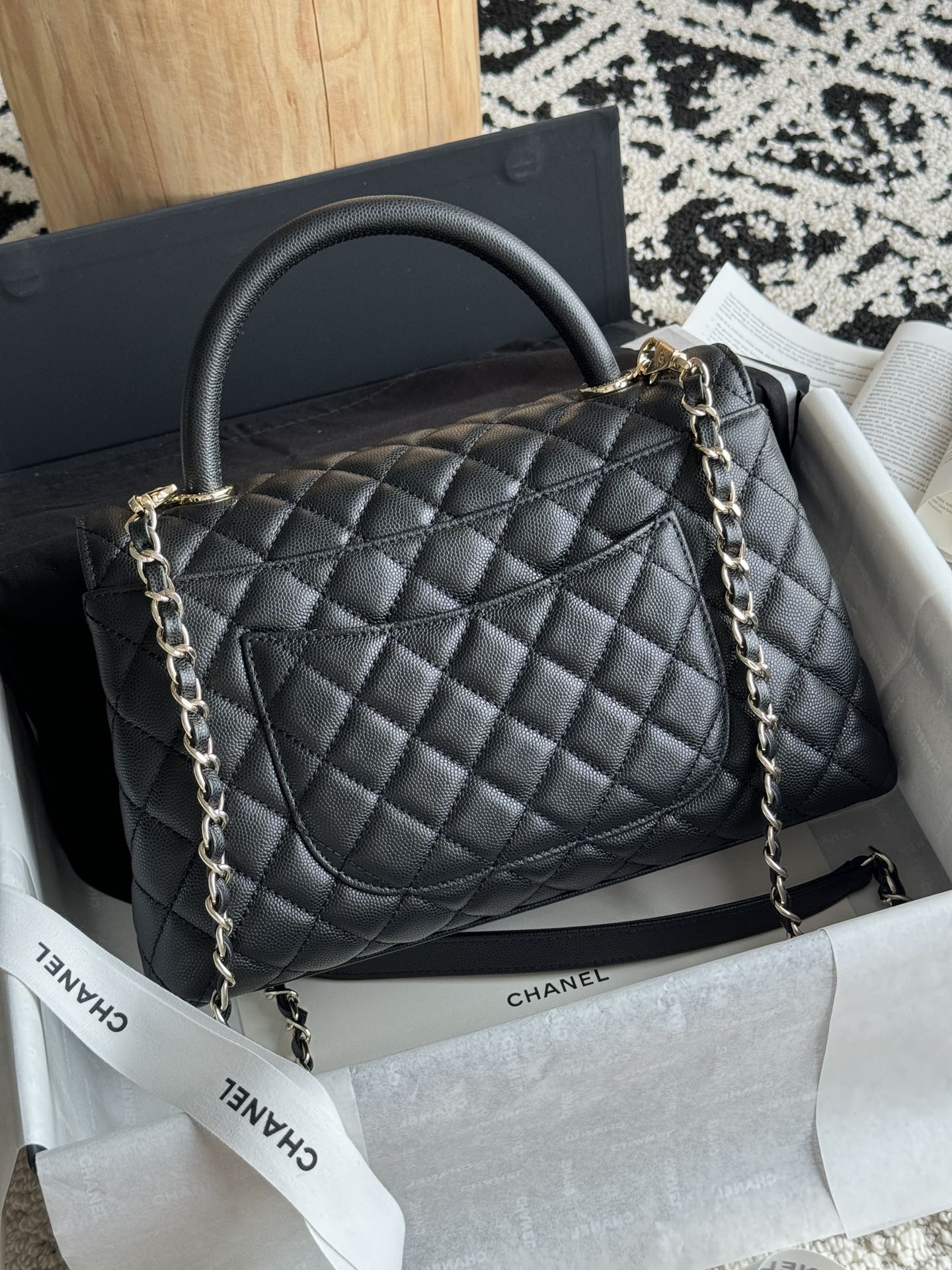 Small Coco Handle Flap Bag in Black Quilted Caviar Leather with Light Gold-Tone Hardware - Mocuir