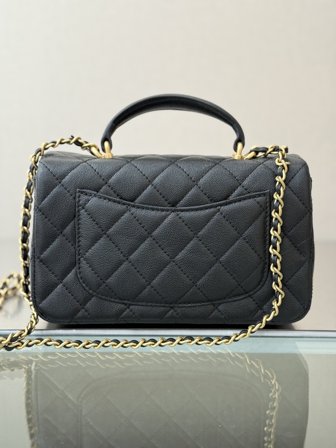 Mini Flap Bag with Top Handle (AS2215) in Black Quilted Grained Calfskin (Caviar) with Antique Gold-Tone Hardware - Mocuir