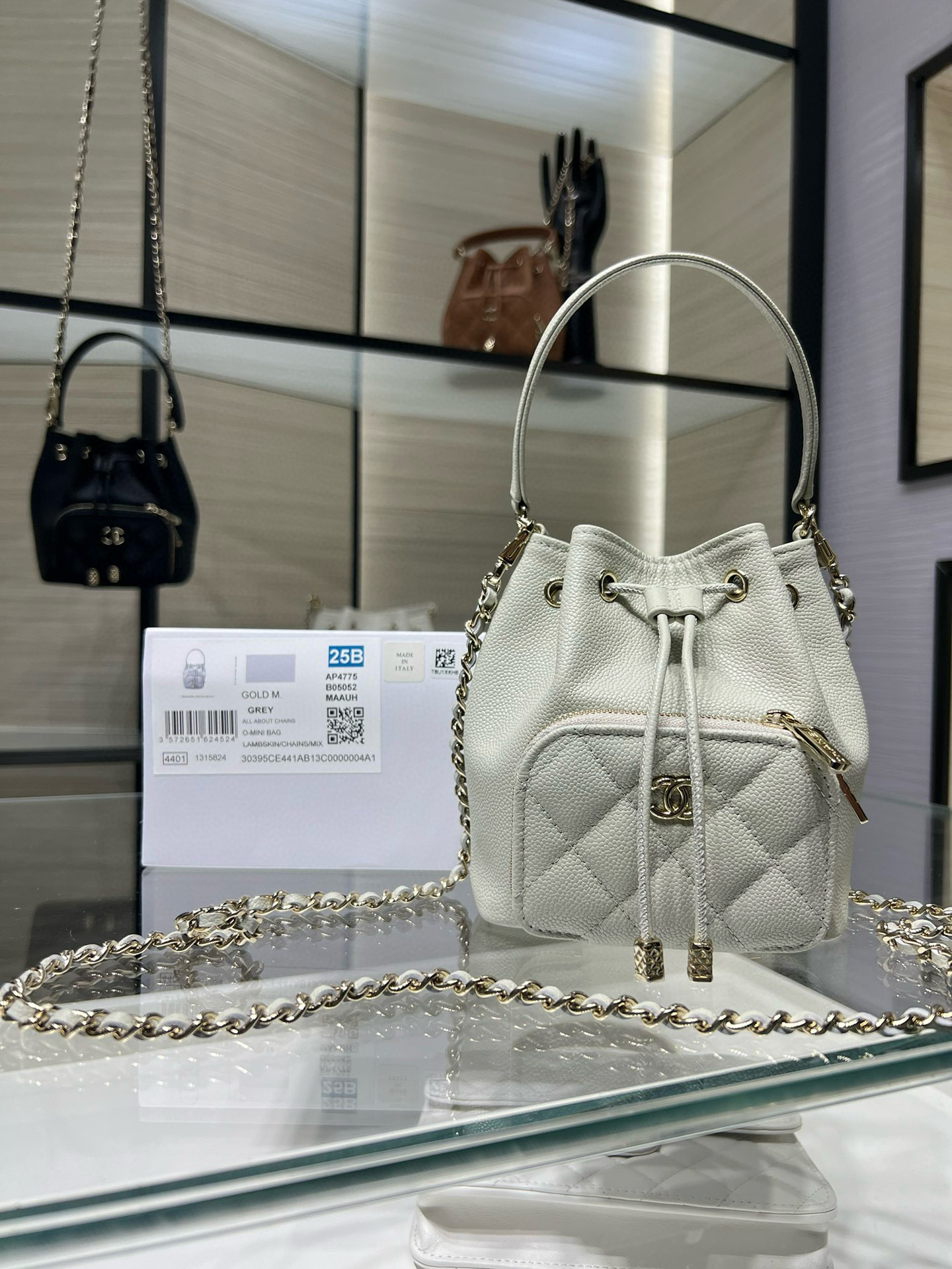 Small Drawstring Bucket Bag in Grey Quilted Grained Calfskin with Gold-Tone Metal (Model AP4775) - Mocuir