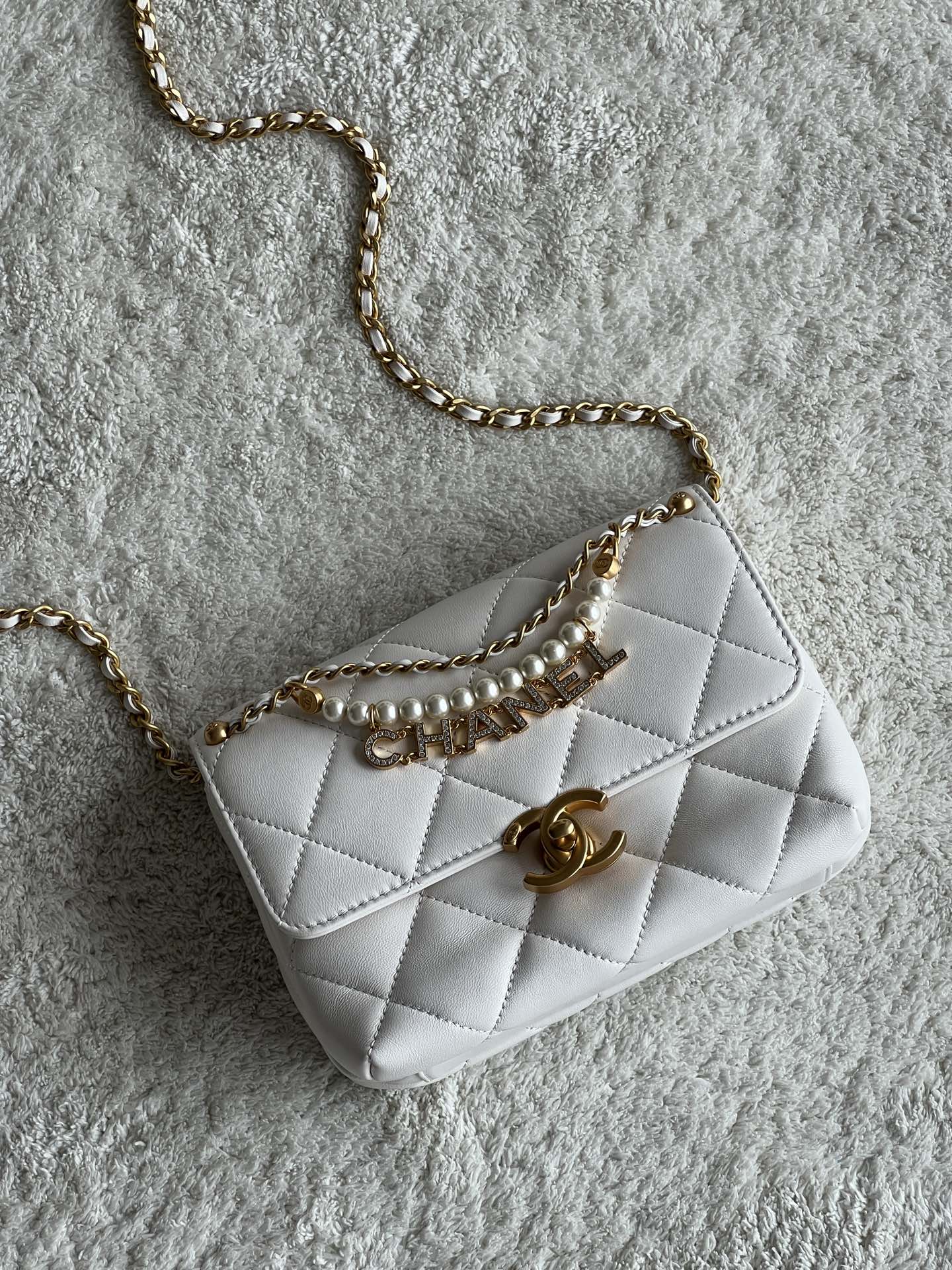 24A Mini Classic Flap Bag in White Quilted Lambskin with Pearl & Crystal CHANEL Letter Chain and Light Gold-Tone Hardware (AS4997) - Mocuir