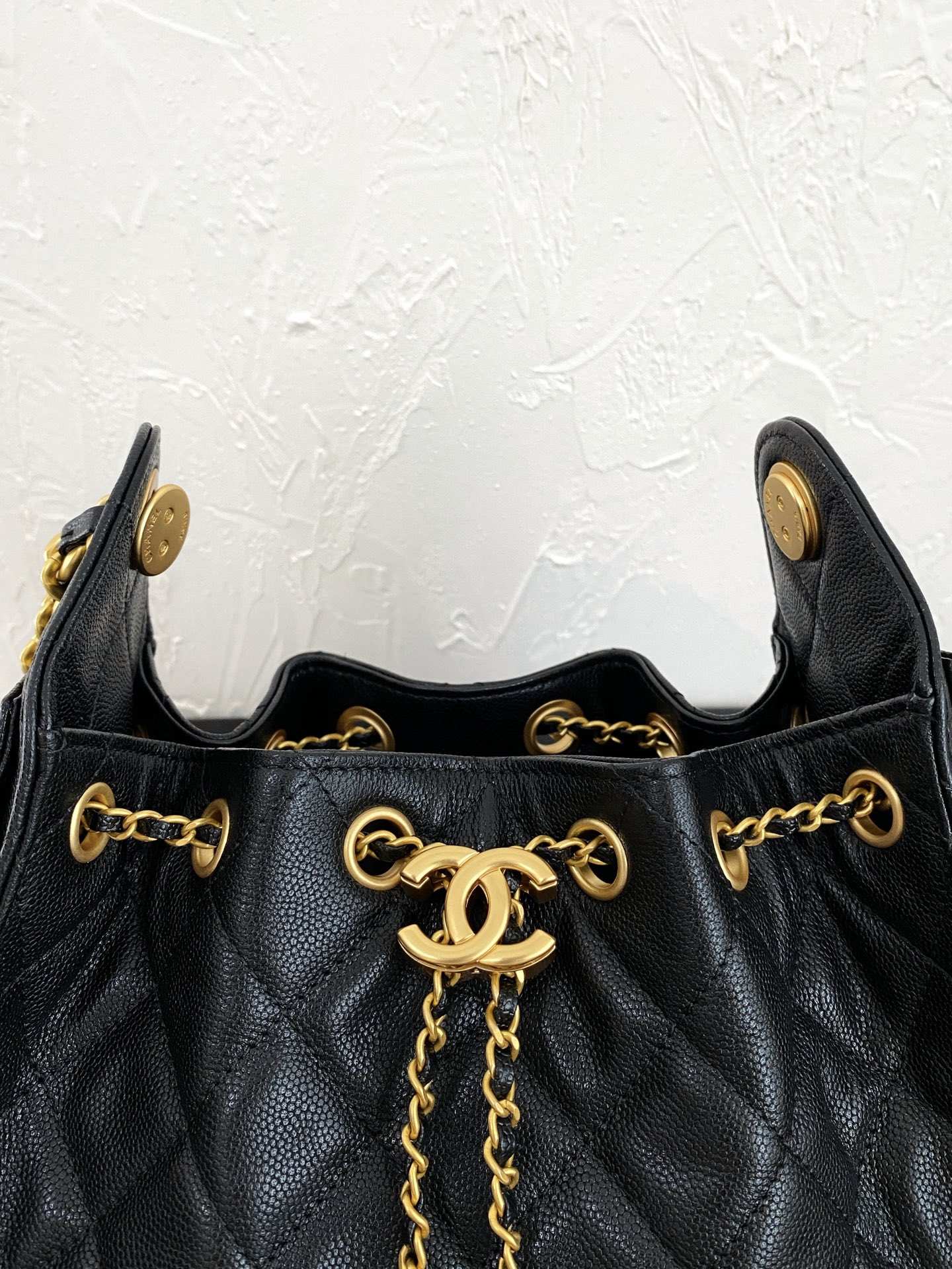 25K Quilted Caviar Leather Bucket Bag with Gold-Tone Hardware - Mocuir