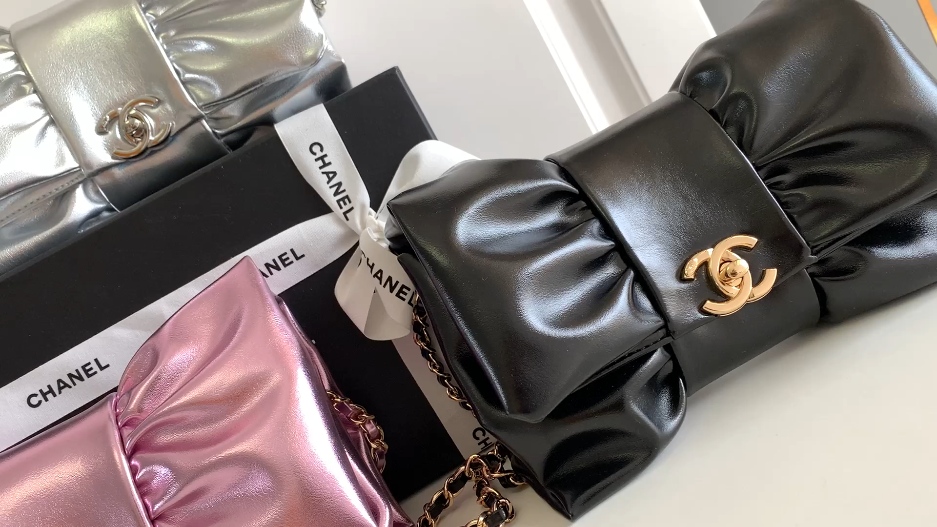 24C Bow Bag Clutch with Chain in Black Quilted Lambskin with Light Gold-Tone Hardware - Mocuir