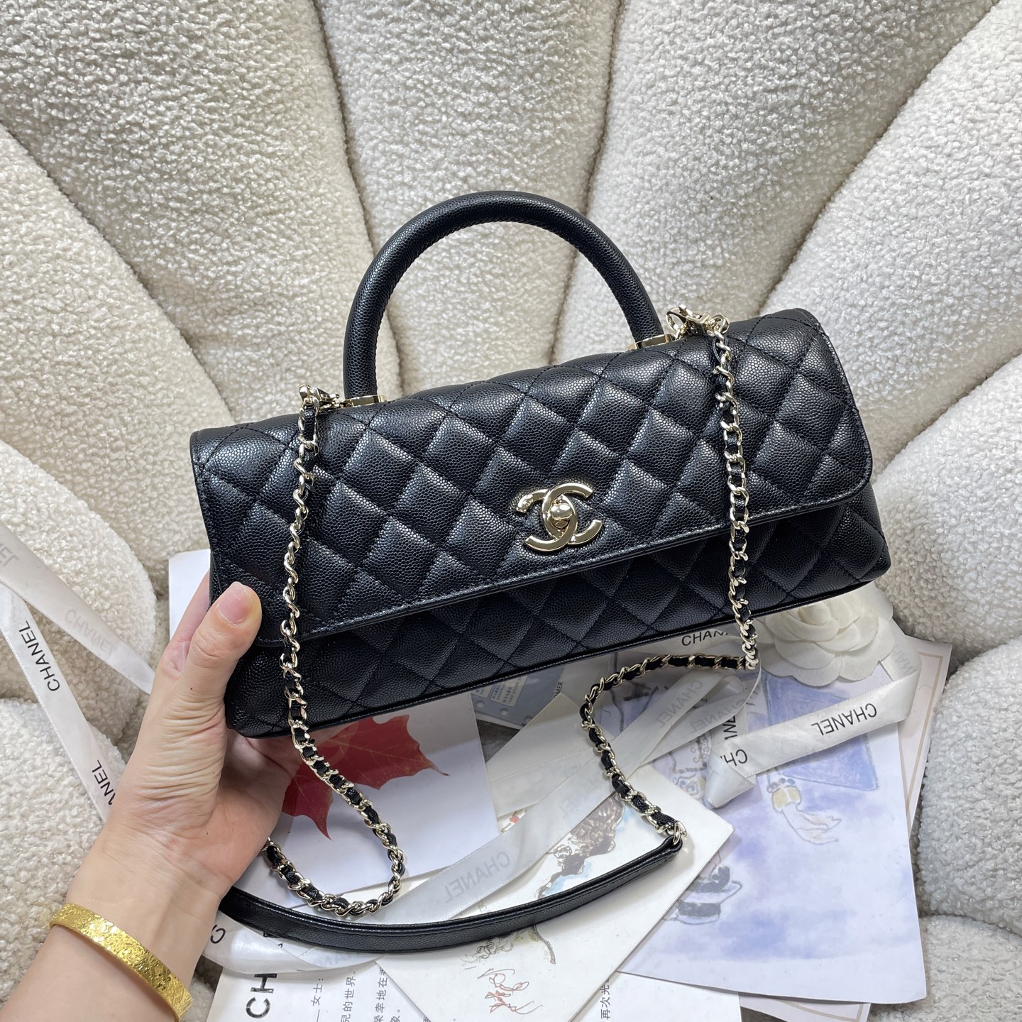 Spring-Summer 2026 Black Quilted Caviar Calfskin Top Handle Flap Bag with Gold-Tone Hardware - Mocuir