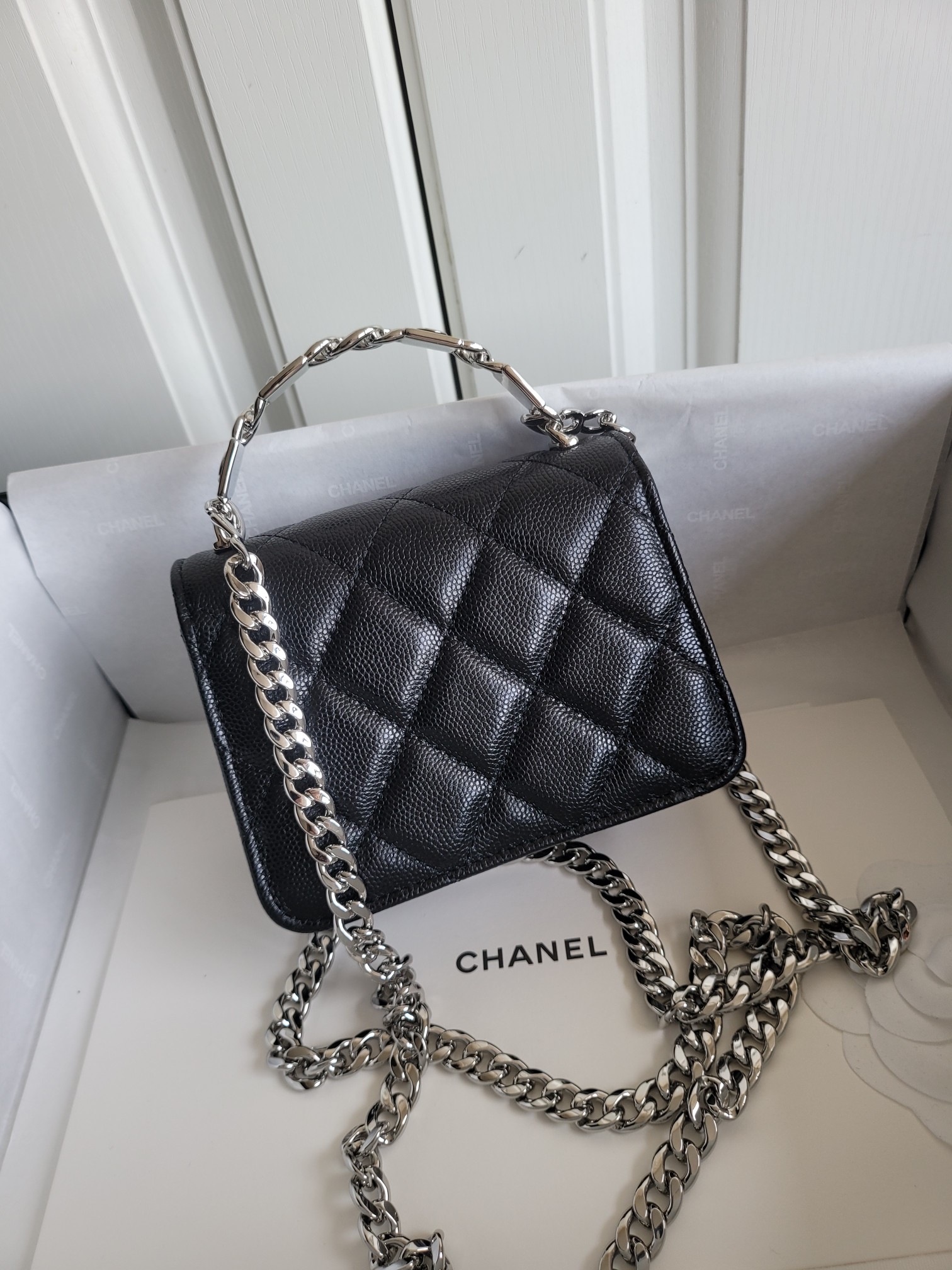 22S Mini Classic Flap Bag with Top Handle in Black Quilted Caviar Leather with Silver-Tone Hardware - Mocuir