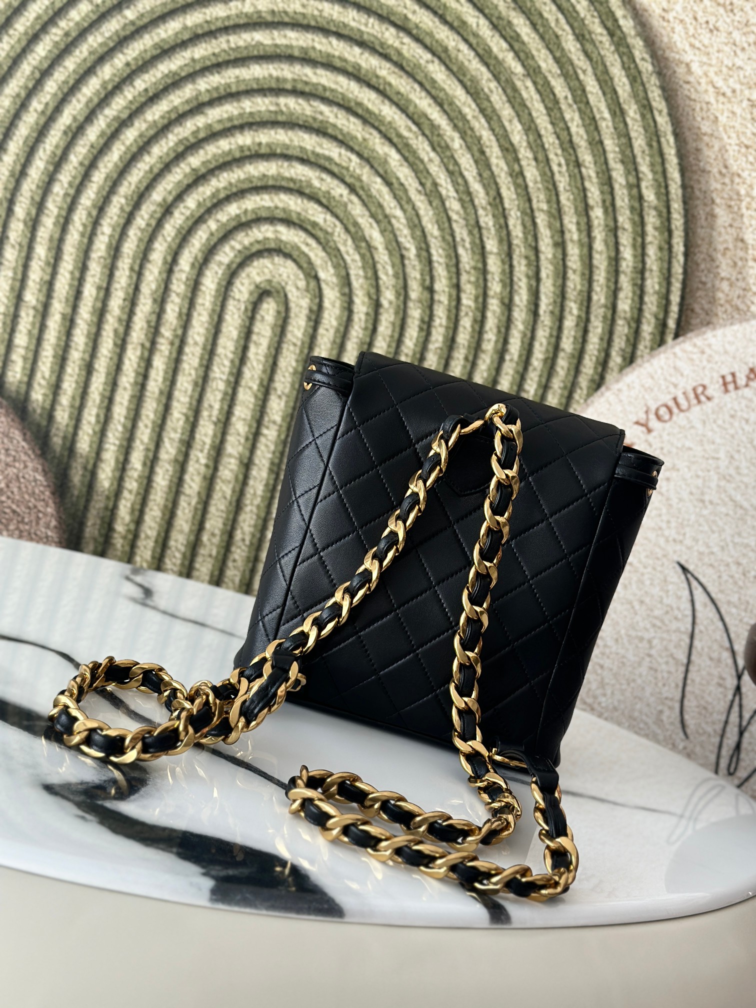 Classic Quilted Lambskin Drawstring Backpack in Black (Gold Hardware) - Mocuir