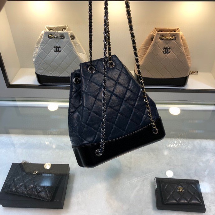 Gabrielle Small Quilted Aged Calfskin Backpack in Navy Blue & Black - Mocuir