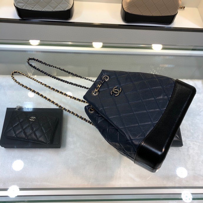 Gabrielle Small Quilted Aged Calfskin Backpack in Navy Blue & Black - Mocuir