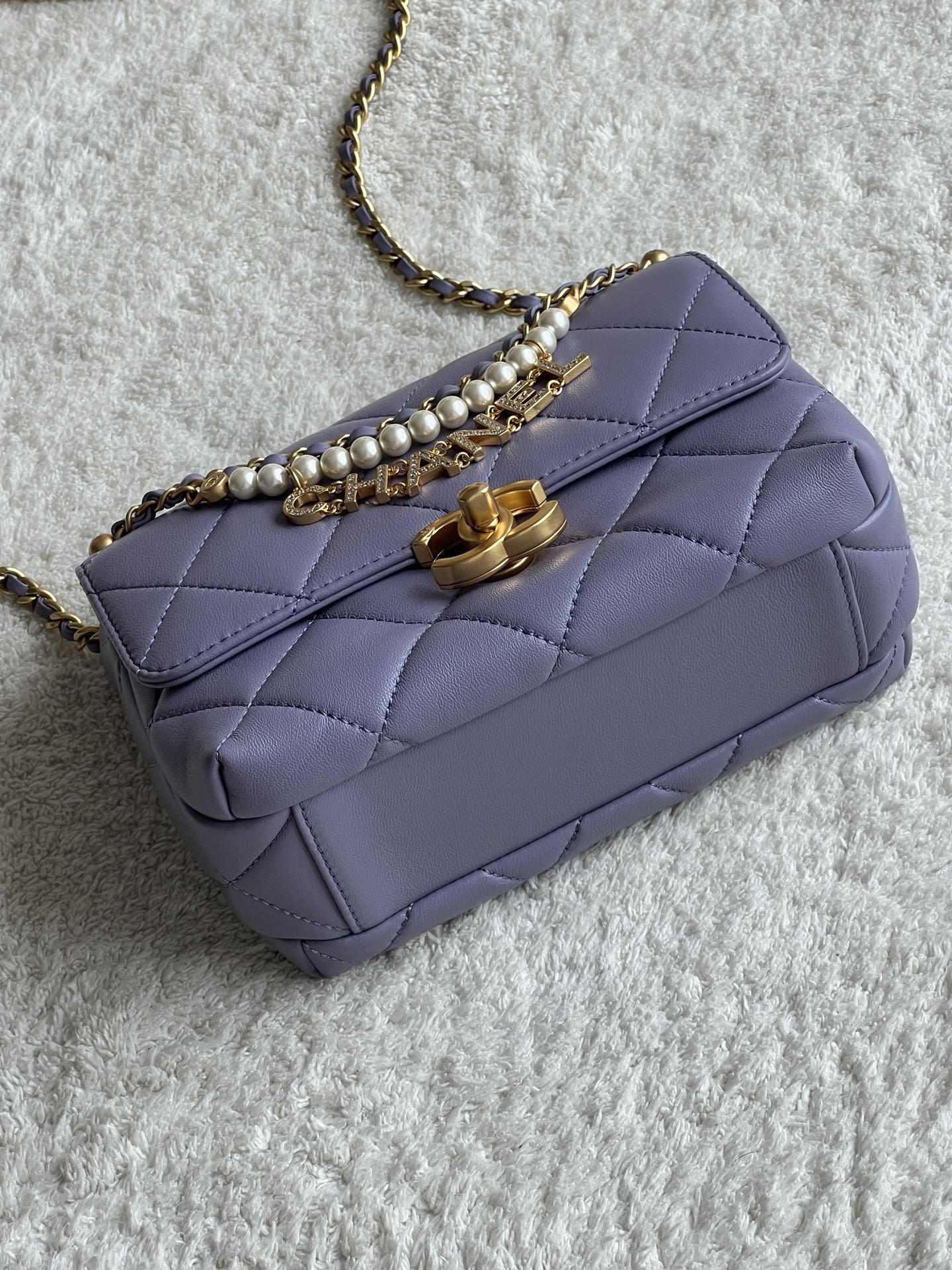 24A Mini Classic Flap Bag in Tato Purple Quilted Lambskin with Pearl & Crystal CHANEL Letter Chain and Light Gold-Tone Hardware (AS4997) - Mocuir