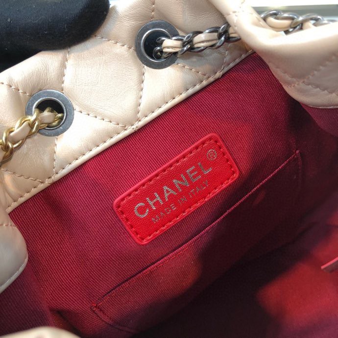 Gabrielle Small Quilted Aged Calfskin Backpack in Beige & Black - Mocuir