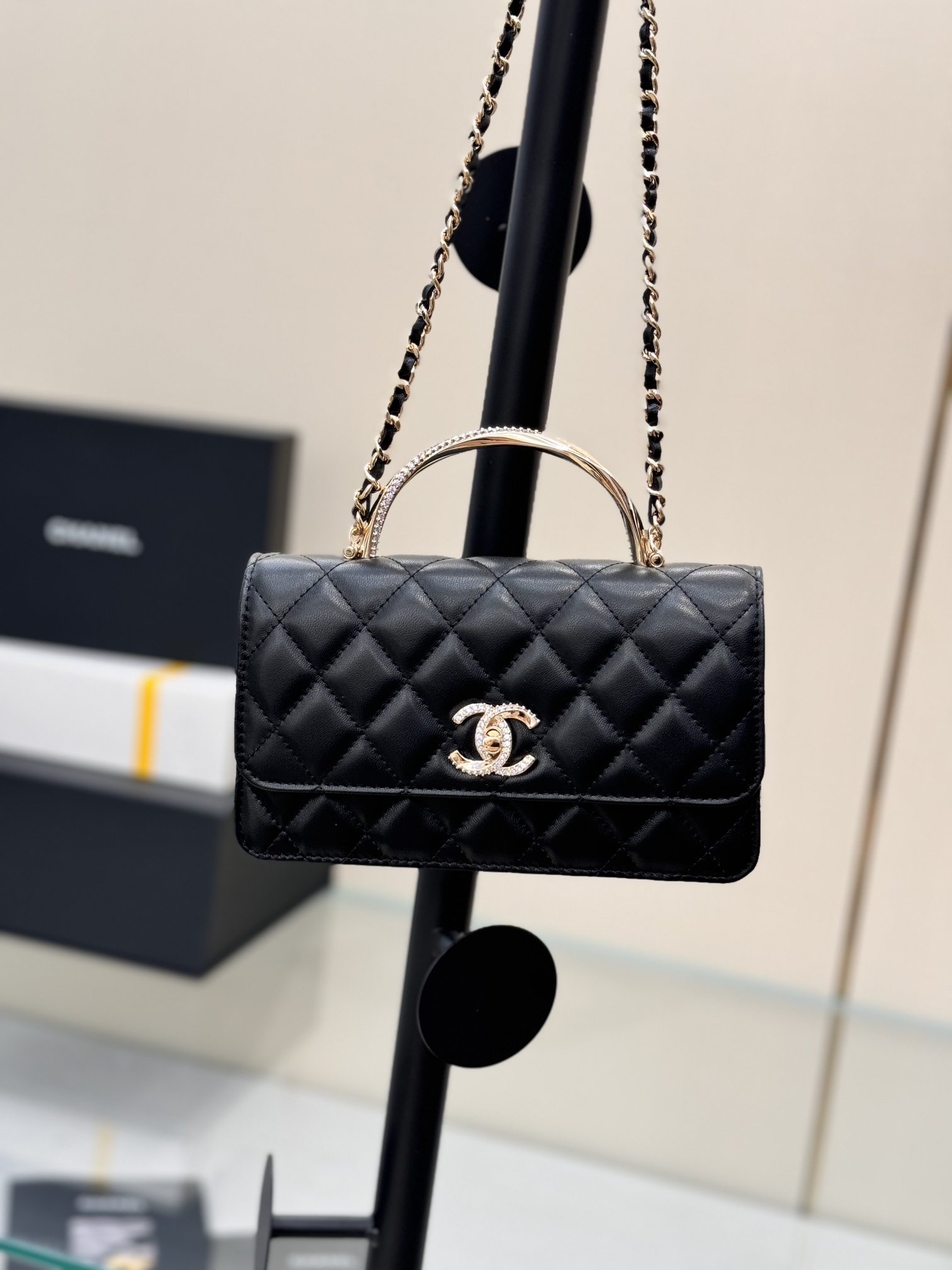 Wallet on Chain (WOC) with Crystal-Embellished Handle in Black Quilted Lambskin with Gold-Tone Hardware - Mocuir