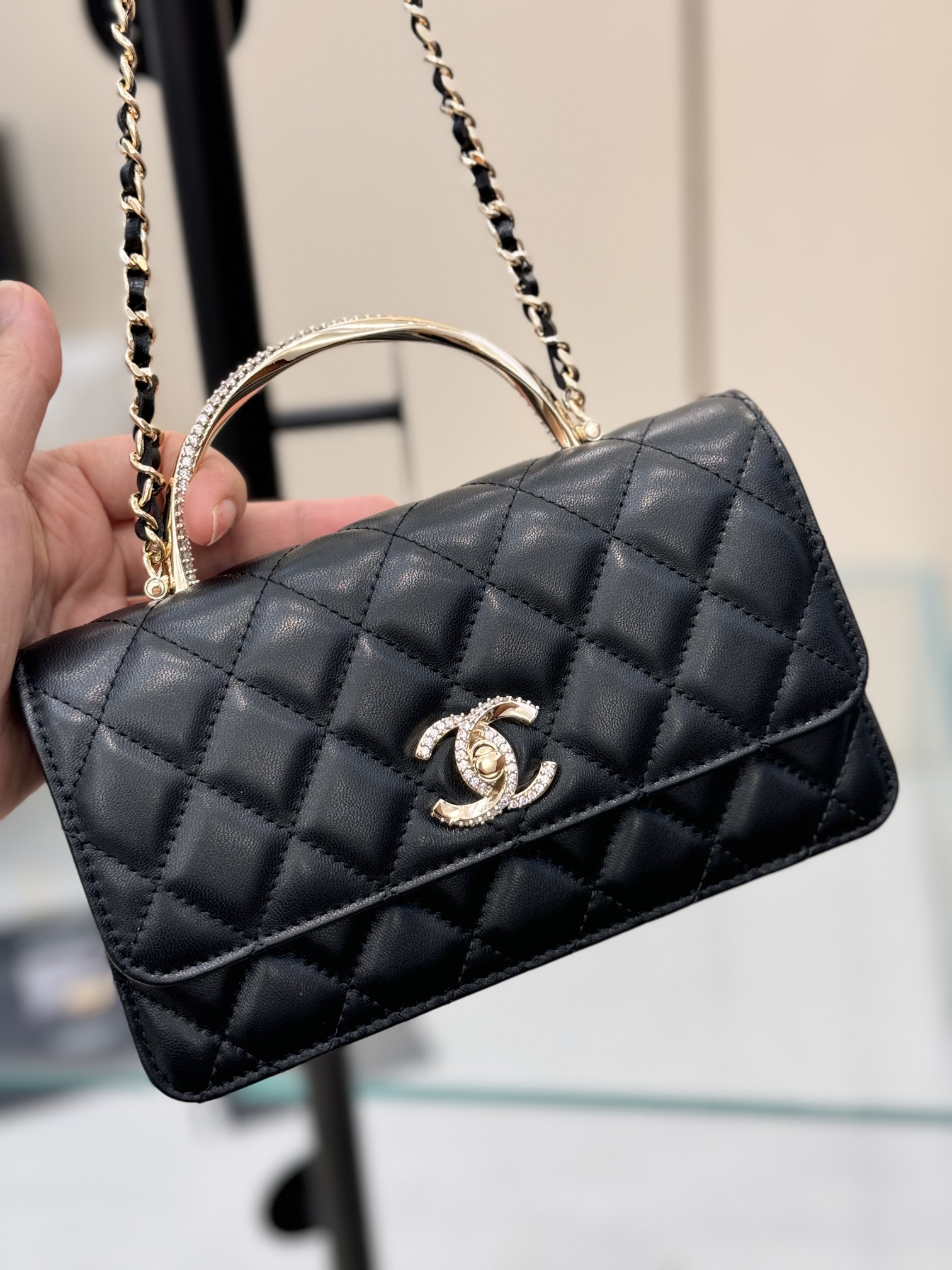 Wallet on Chain (WOC) with Crystal-Embellished Handle in Black Quilted Lambskin with Gold-Tone Hardware - Mocuir