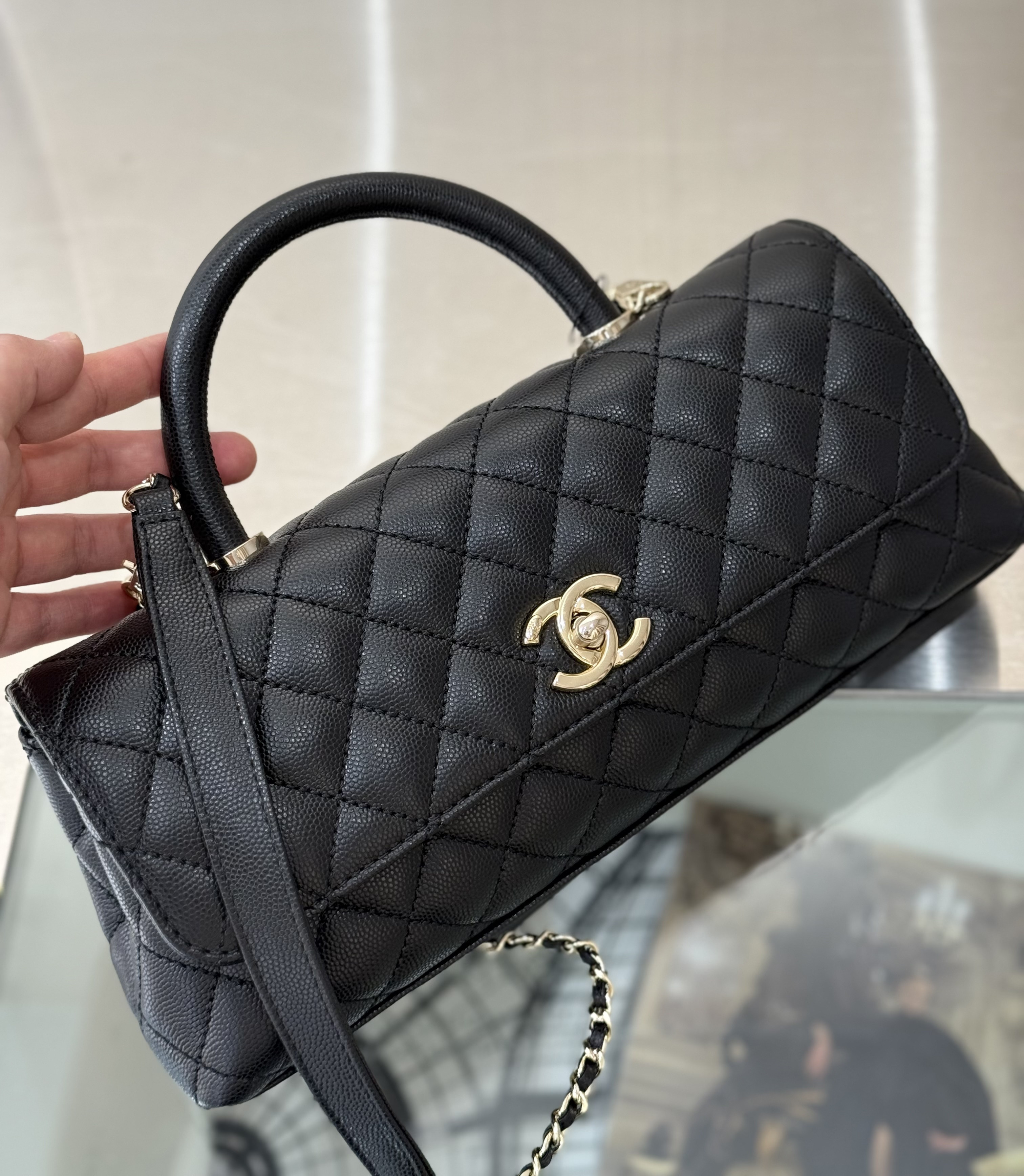 Cruise 2026 Black Quilted Grained Calfskin Top Handle Flap Bag with Gold-Tone Hardware & Chain Strap - Mocuir