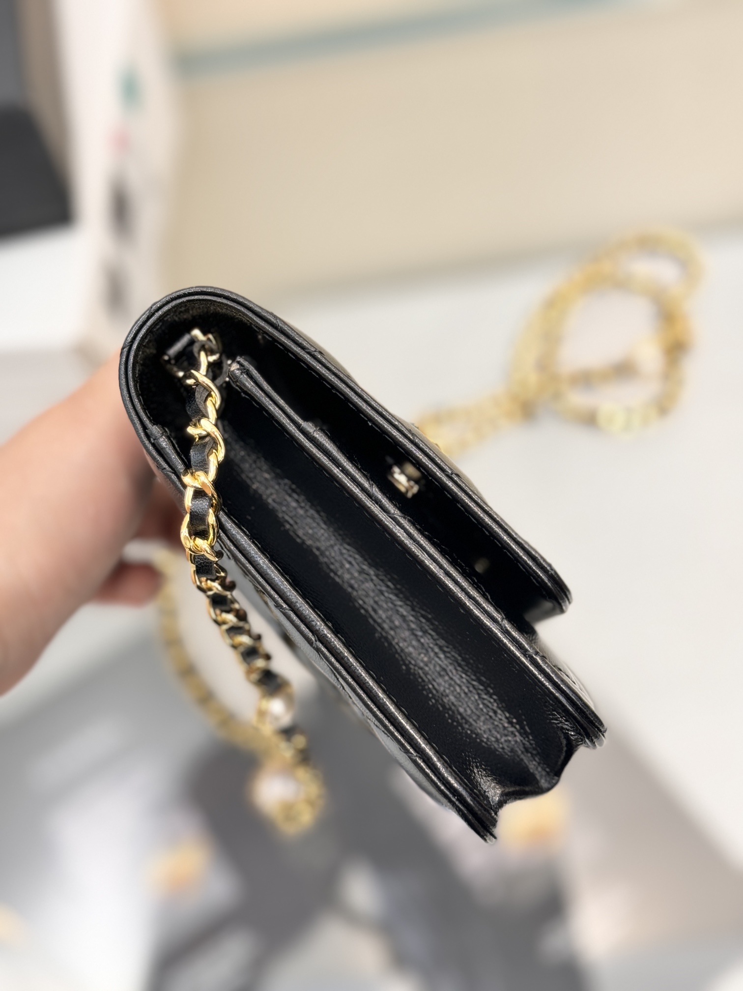 Classic Wallet On Chain (WOC) with Pearl Detail in Black Quilted Lambskin with Light Gold-Tone Hardware - Mocuir