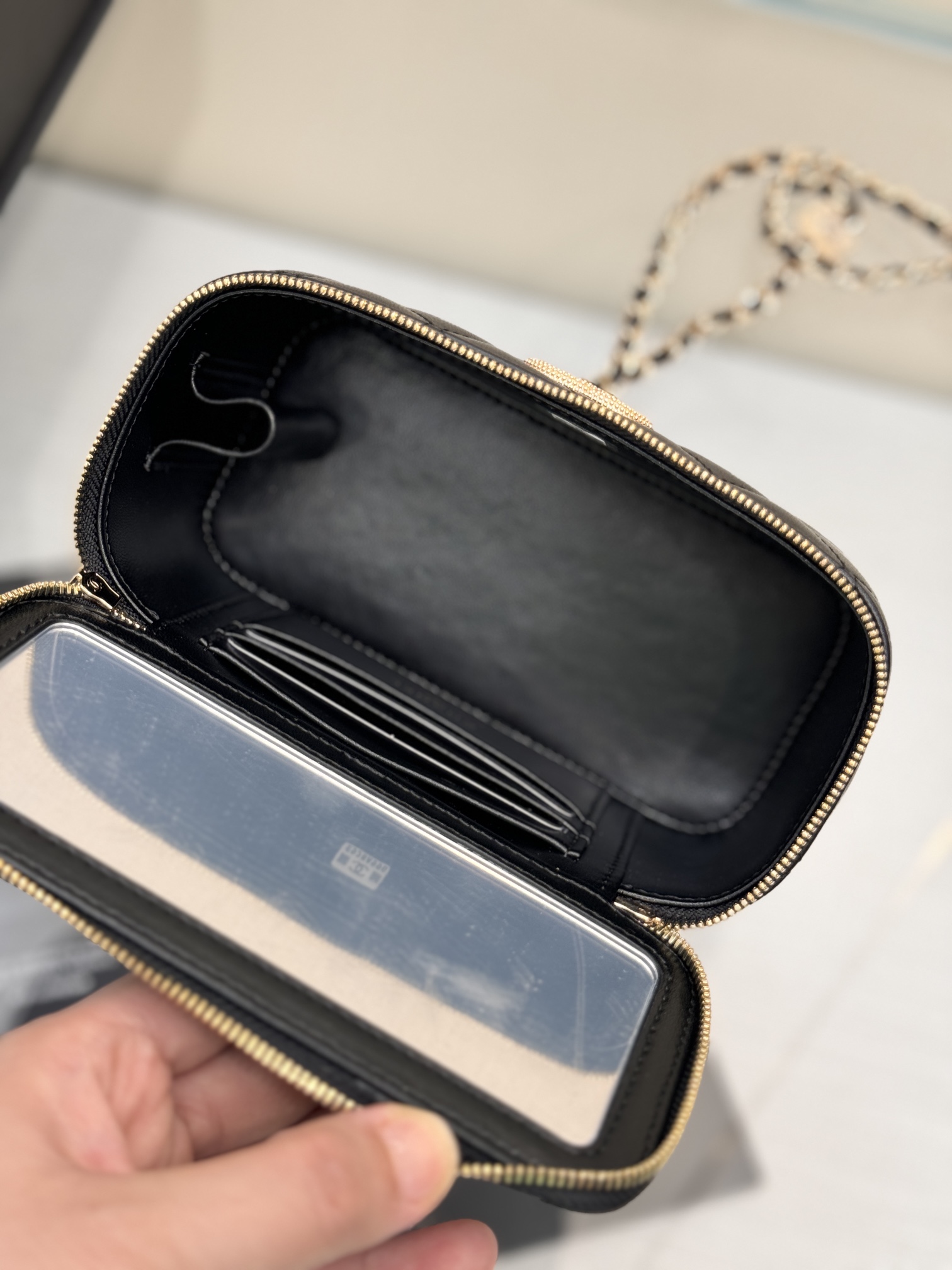 Long Vanity Case with Chain in Black Quilted Calfskin with Crystal CC Logo & Light Gold-Tone Hardware - Mocuir