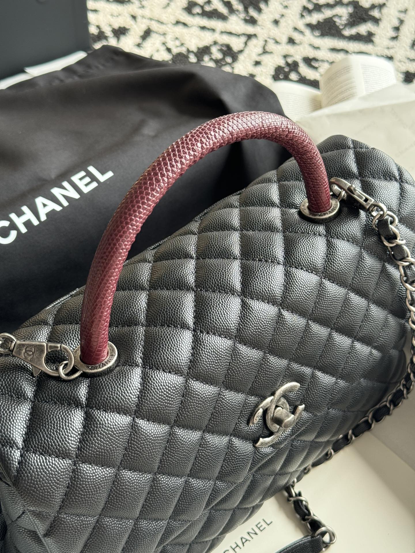 Large Coco Handle Flap Bag in Black Quilted Caviar Leather with Burgundy Lizard Handle and Ruthenium-Finish Hardware - Mocuir