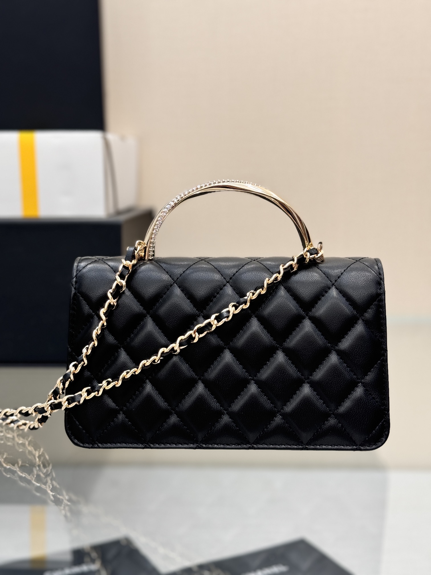 Wallet on Chain (WOC) with Crystal-Embellished Handle in Black Quilted Lambskin with Gold-Tone Hardware - Mocuir