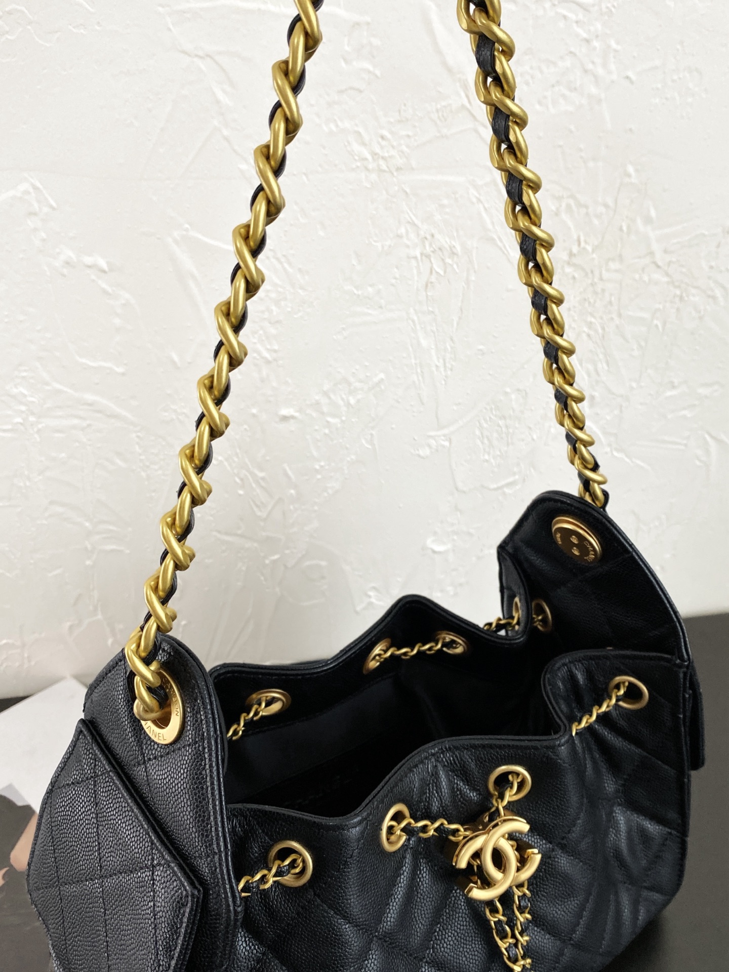 25K Quilted Caviar Leather Bucket Bag with Gold-Tone Hardware - Mocuir