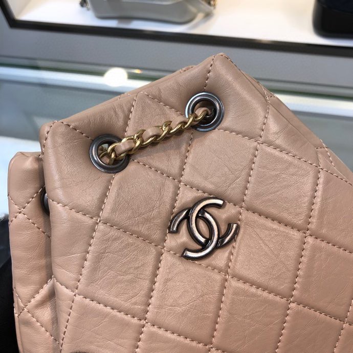 Gabrielle Small Quilted Aged Calfskin Backpack in Beige & Black - Mocuir