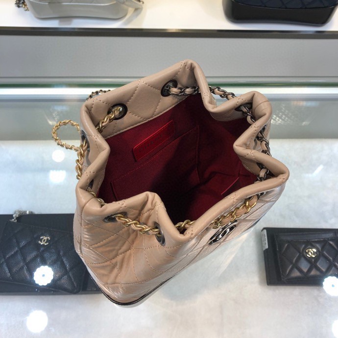 Gabrielle Small Quilted Aged Calfskin Backpack in Beige & Black - Mocuir