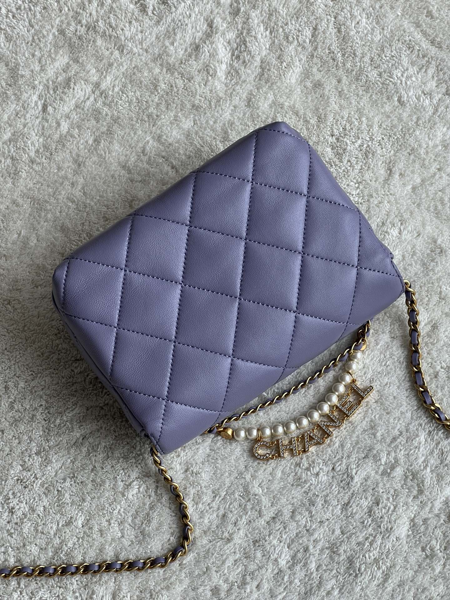 24A Mini Classic Flap Bag in Tato Purple Quilted Lambskin with Pearl & Crystal CHANEL Letter Chain and Light Gold-Tone Hardware (AS4997) - Mocuir