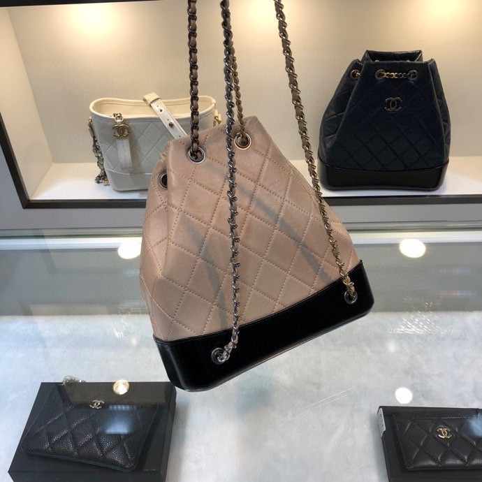 Gabrielle Small Quilted Aged Calfskin Backpack in Beige & Black - Mocuir