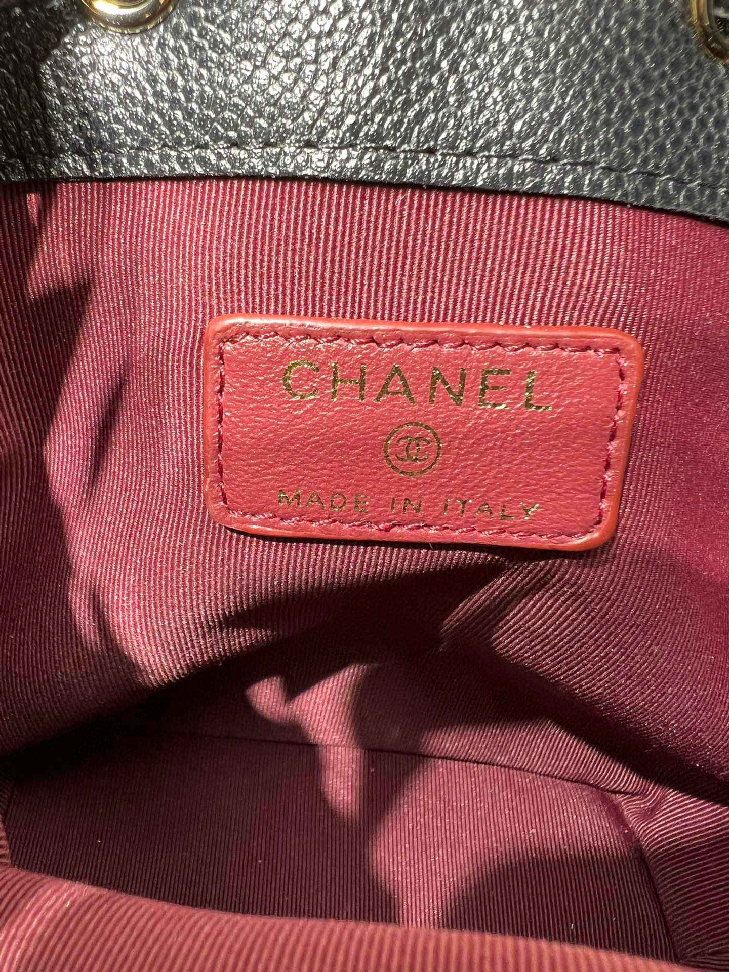 Small Drawstring Bucket Bag in Black Quilted Grained Calfskin with Gold-Tone Metal (Model AP4775) - Mocuir