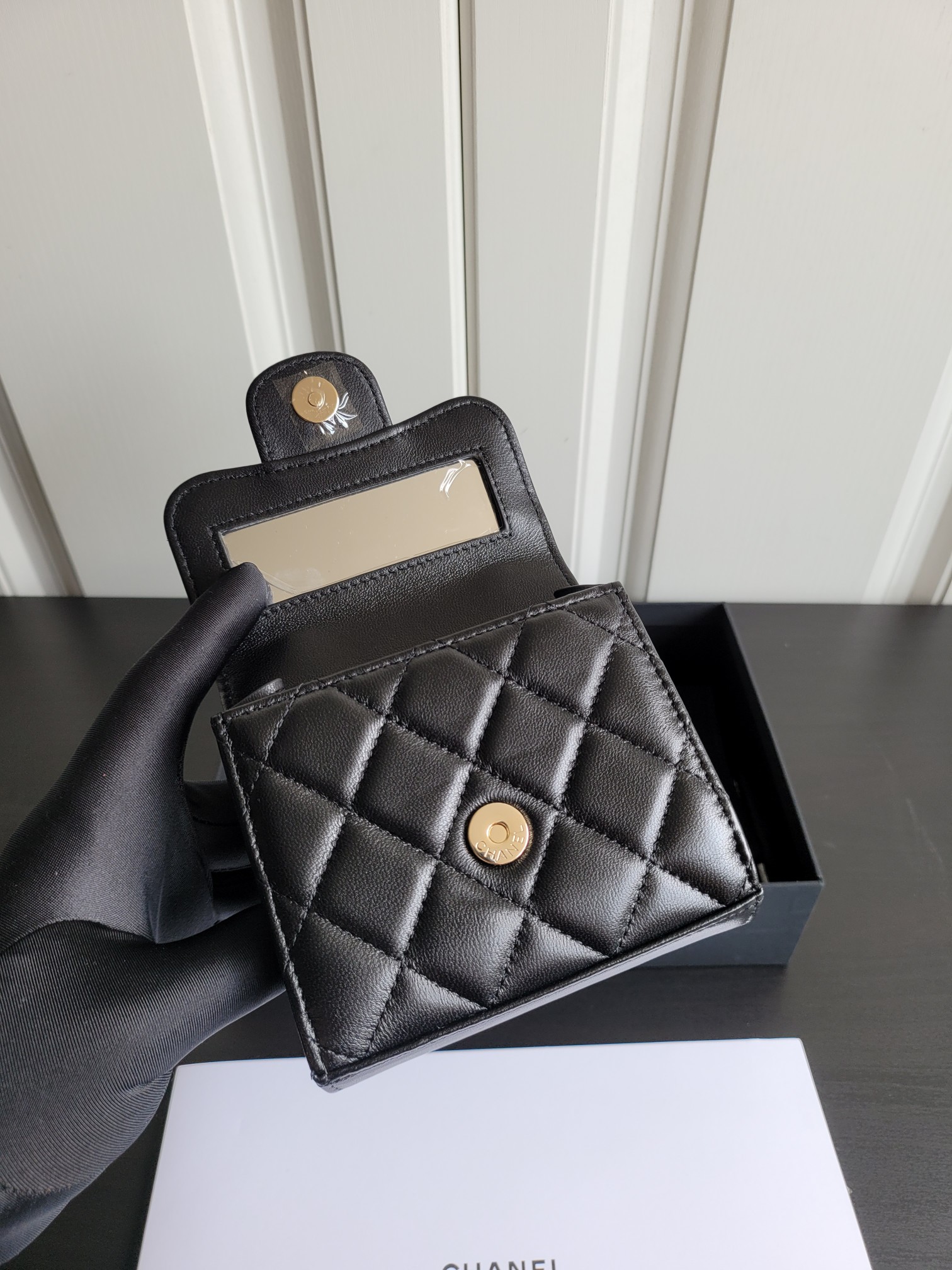 23P Mini Classic Flap Bag with Top Handle in Black Quilted Caviar Leather with Light Gold-Tone Hardware - Mocuir