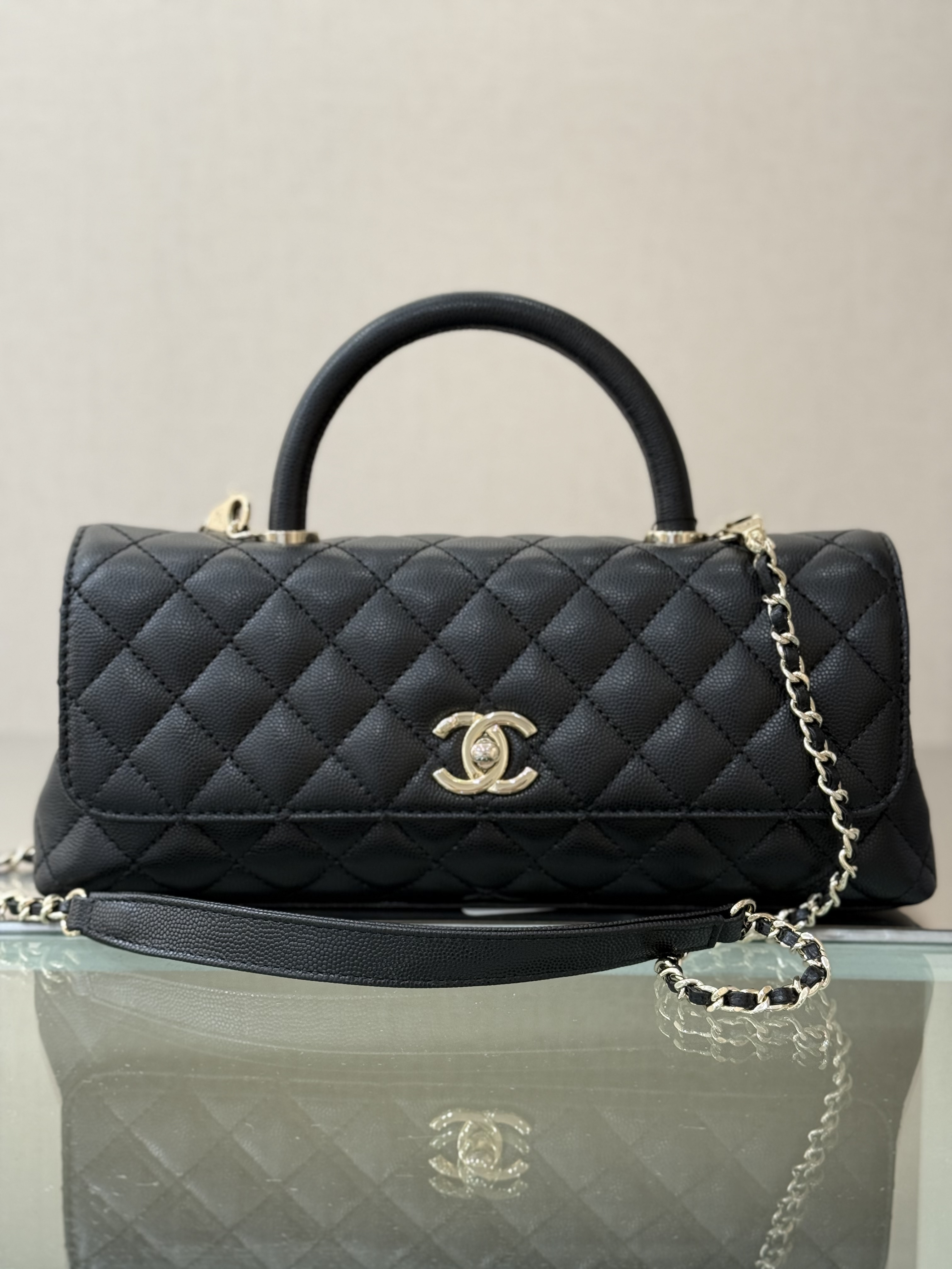 Cruise 2026 Black Quilted Grained Calfskin Top Handle Flap Bag with Gold-Tone Hardware & Chain Strap - Mocuir