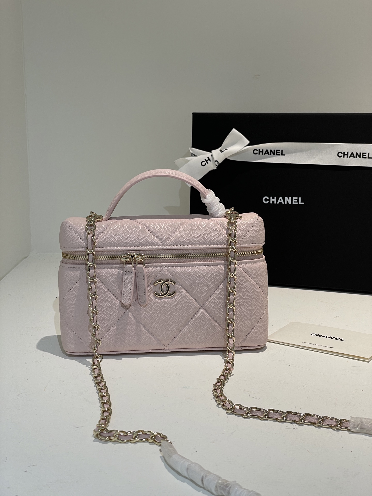 Light Pink Quilted Caviar Calfskin Vanity Case with Top Handle and Gold-Tone Chain Strap - Mocuir