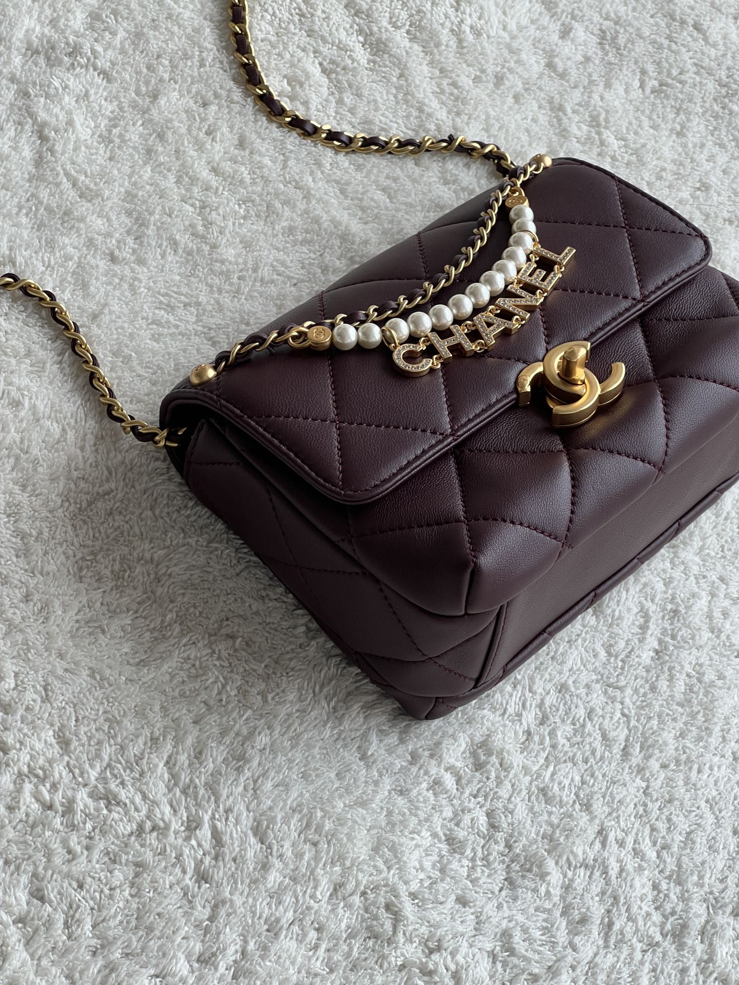 24A Mini Classic Flap Bag in Burgundy Quilted Lambskin with Pearl & Crystal CHANEL Letter Chain and Light Gold-Tone Hardware (AS4997) - Mocuir