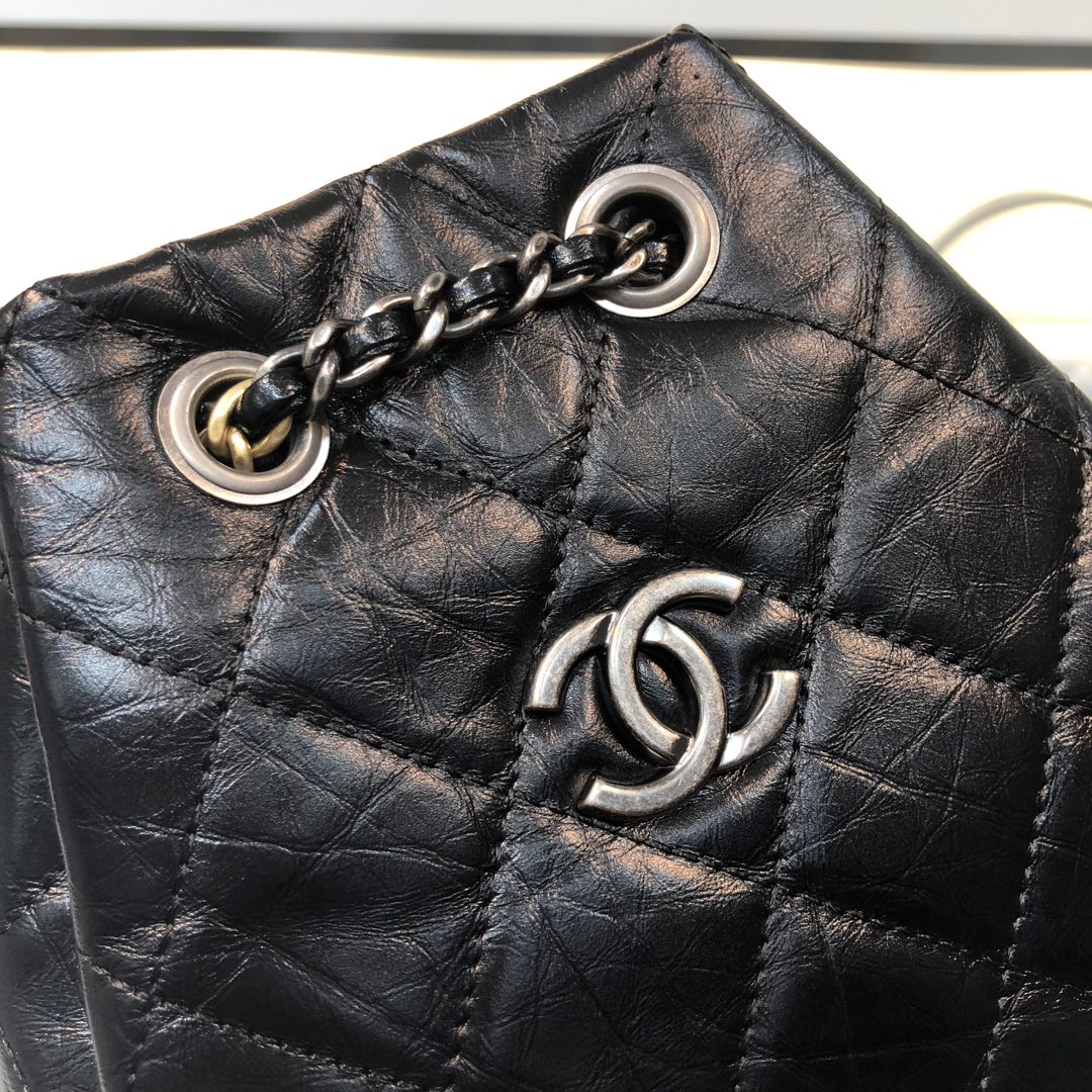 Gabrielle Small Quilted Aged Calfskin Backpack in Black - Mocuir