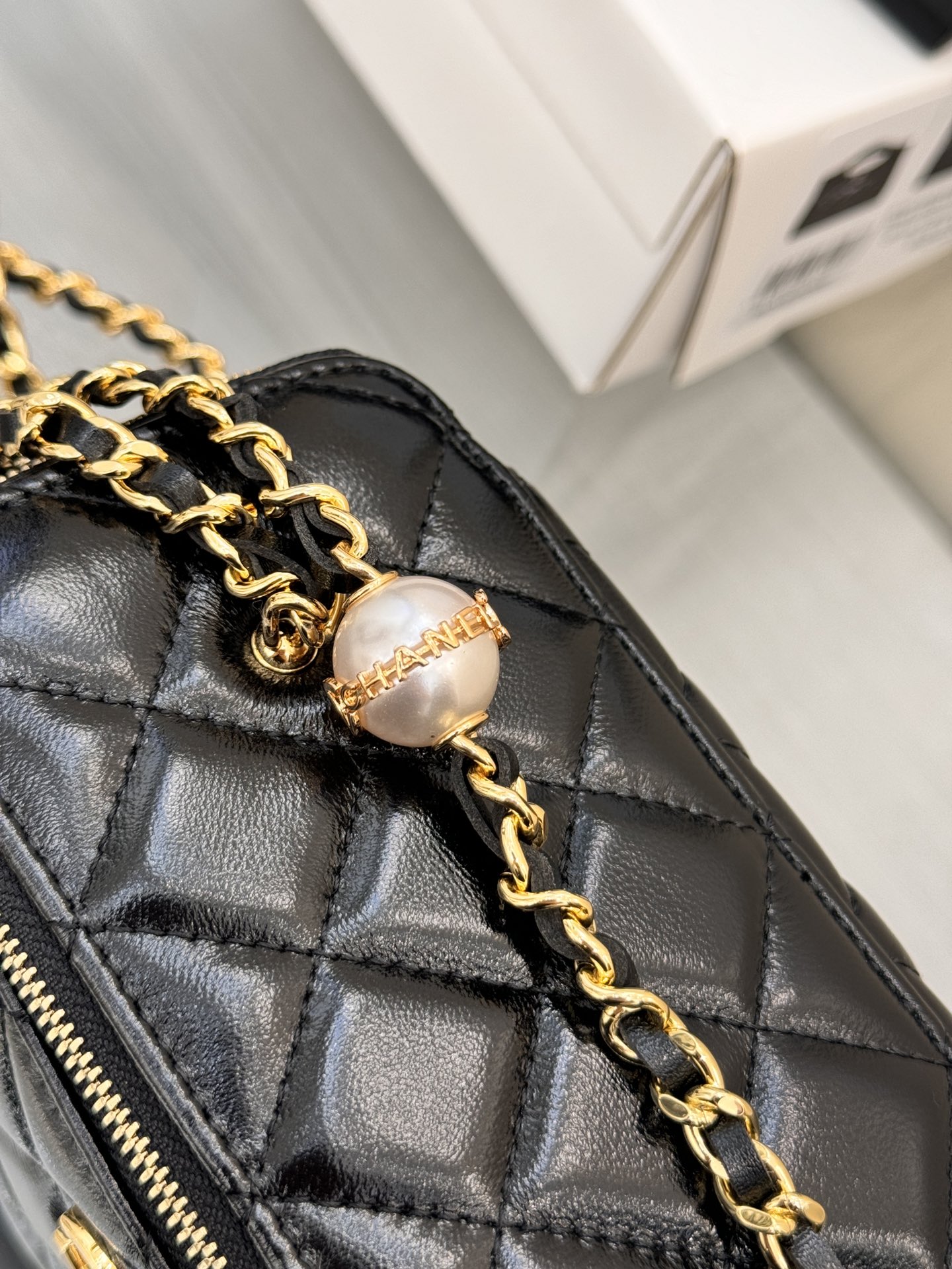 Long Vanity Case with Chain & Pearl Detail in Black Quilted Lambskin with Light Gold-Tone Hardware - Mocuir