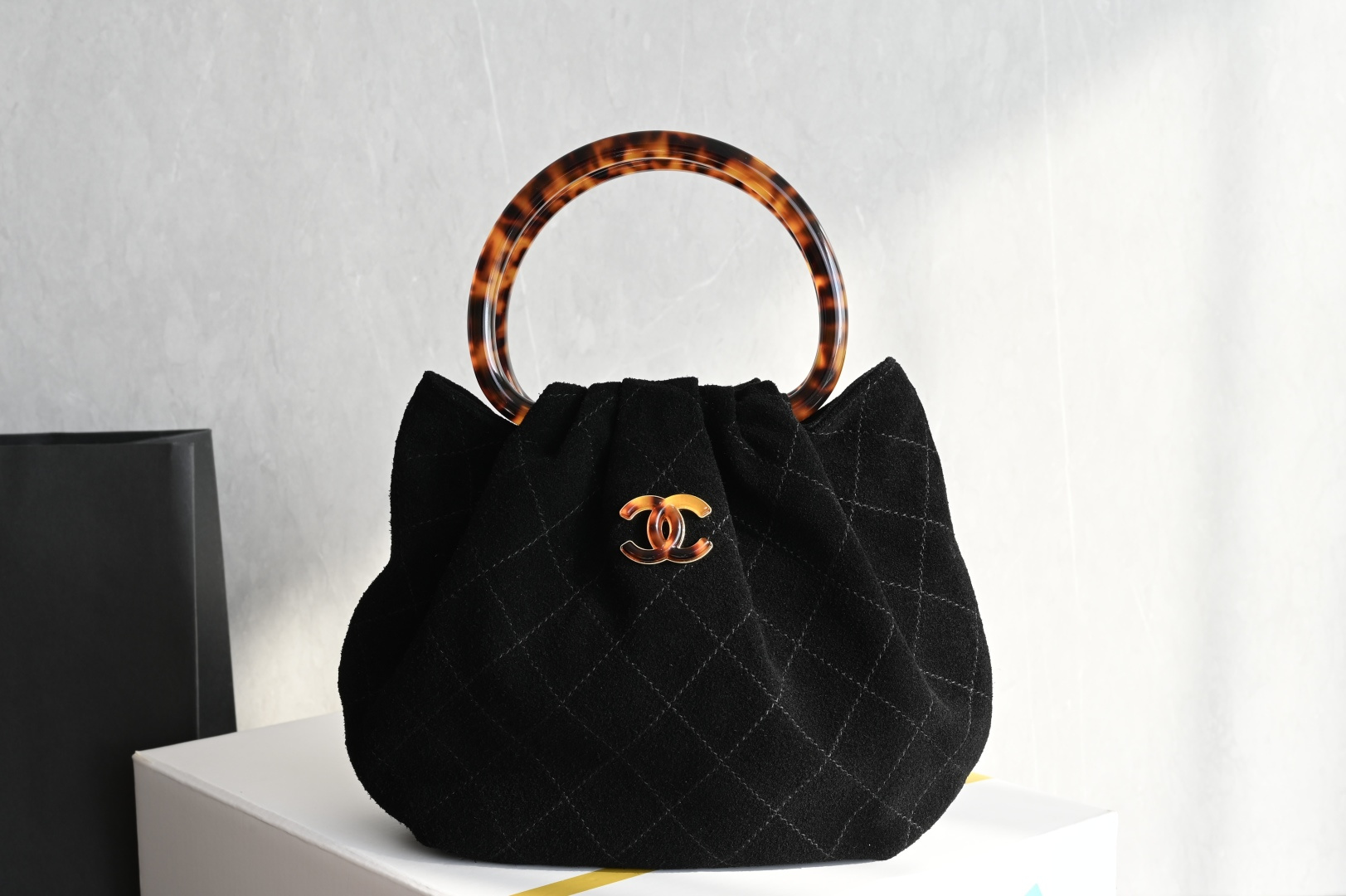 Small Hobo Bag in Black Suede Calfskin with Tortoiseshell Effect Plexi Handle & Gold-Tone Hardware (26C Cruise Collection) - Mocuir