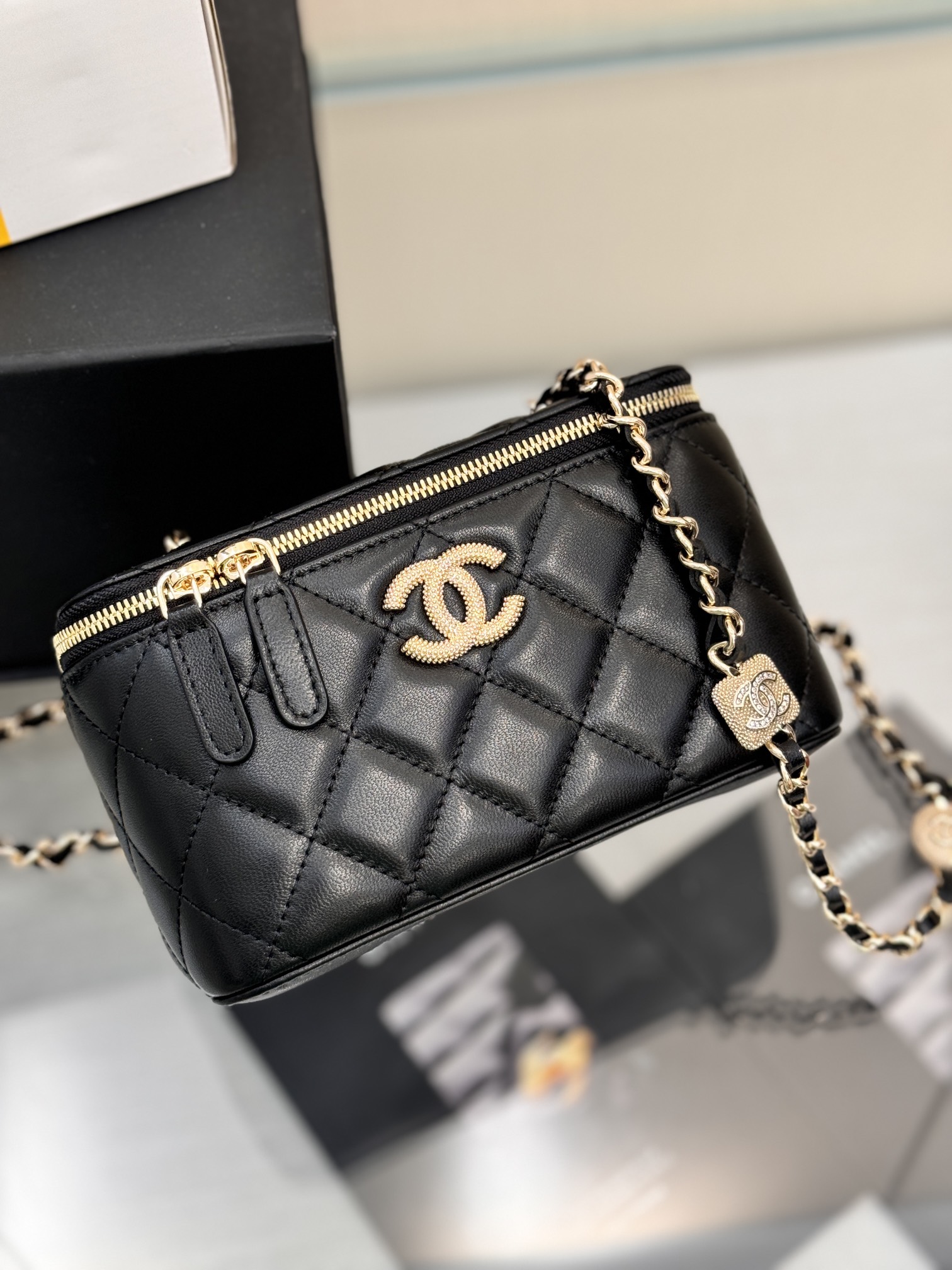 Long Vanity Case with Chain in Black Quilted Calfskin with Crystal CC Logo & Light Gold-Tone Hardware - Mocuir