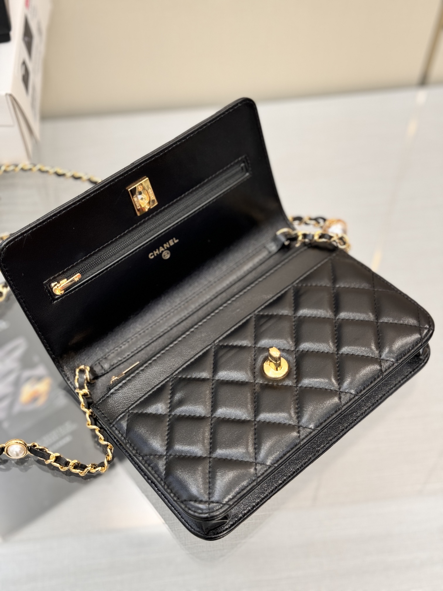 Classic Wallet On Chain (WOC) with Pearl Detail in Black Quilted Lambskin with Light Gold-Tone Hardware - Mocuir