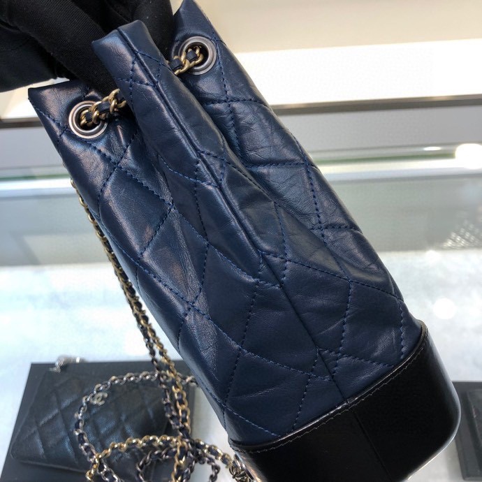 Gabrielle Small Quilted Aged Calfskin Backpack in Navy Blue & Black - Mocuir