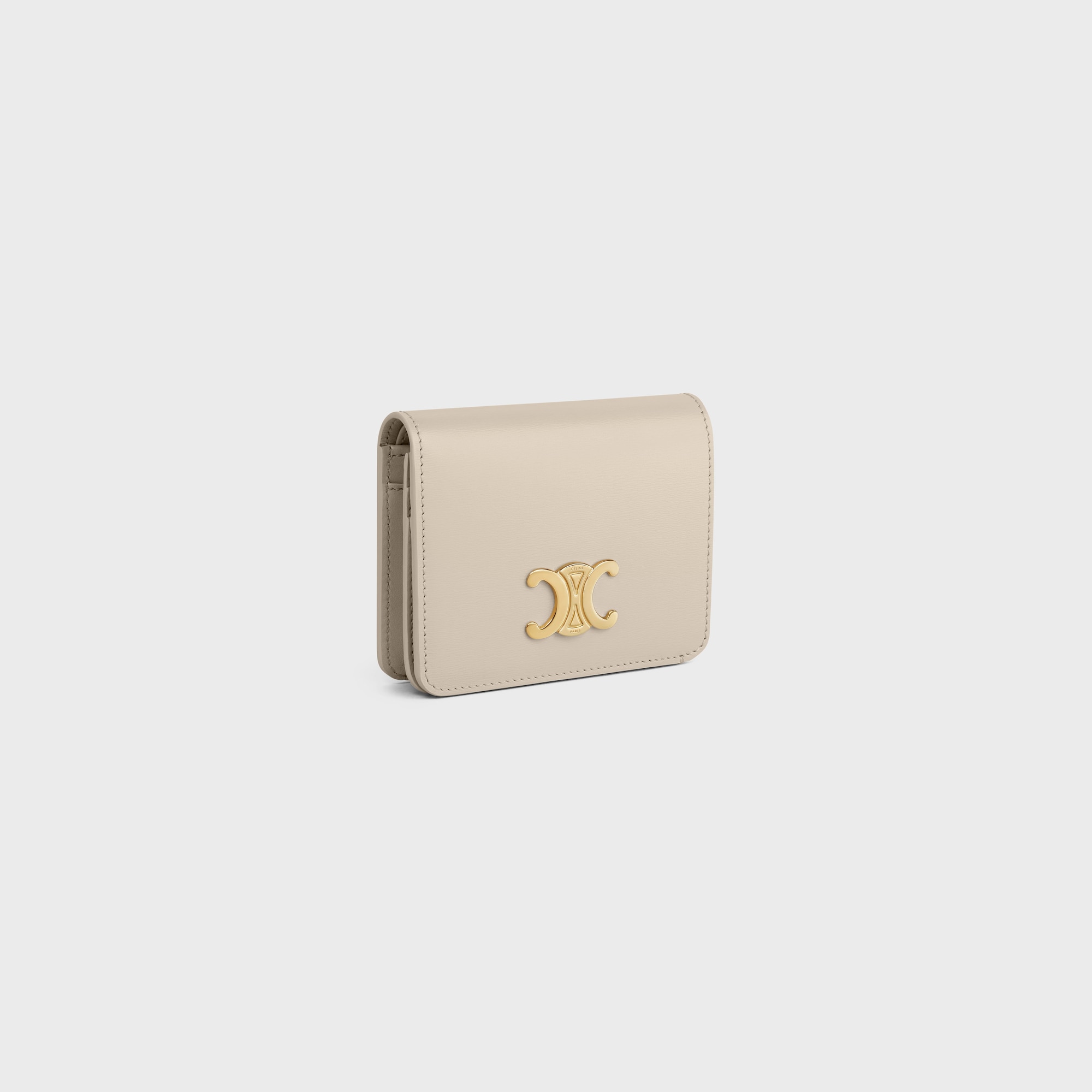 TRIOMPHE COMPACT WALLET IN SHINY CALFSKIN LIGHT STONE