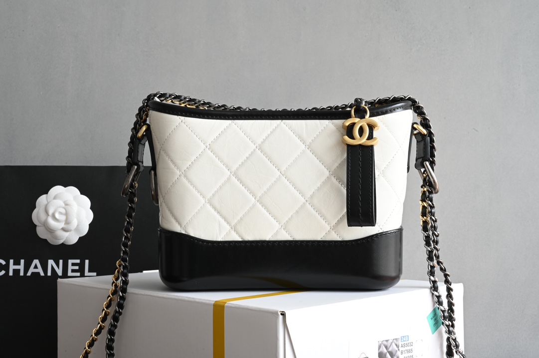 Small Gabrielle Hobo Bag in White and Black Quilted Aged Calfskin with Gold-Tone and Silver-Tone Metal (Model AS0502) - Mocuir