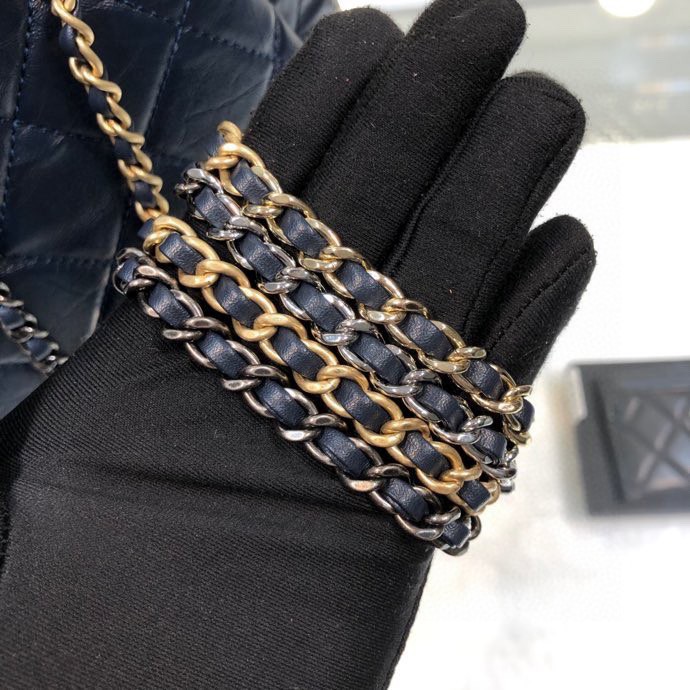 Gabrielle Small Quilted Aged Calfskin Backpack in Navy Blue & Black - Mocuir