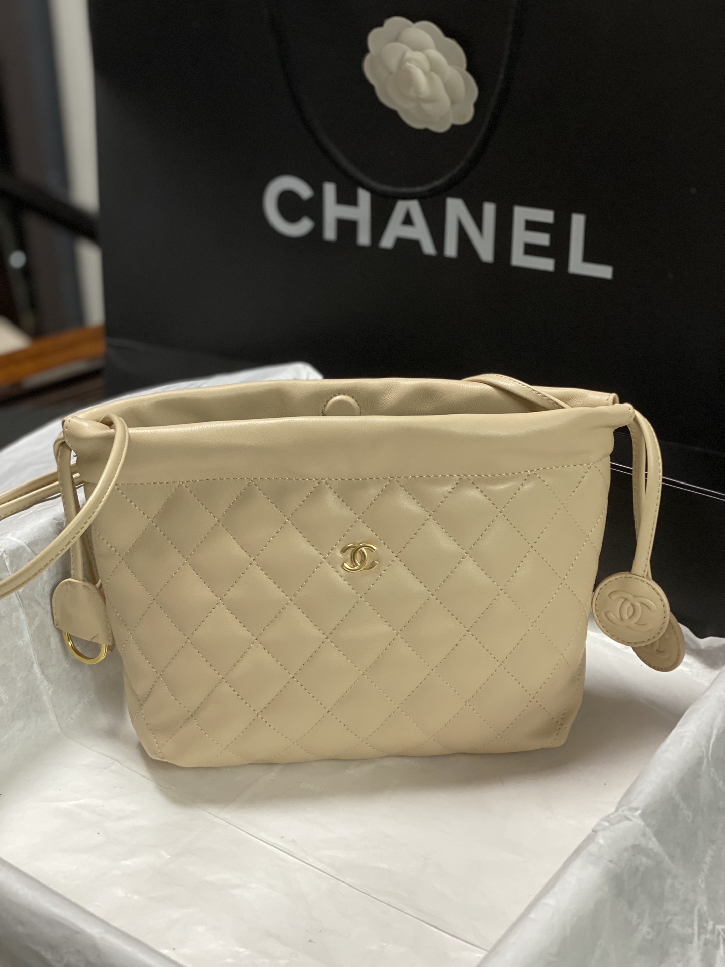 26C Beige Quilted Lambskin Drawstring Bucket Bag with Gold Hardware - Mocuir