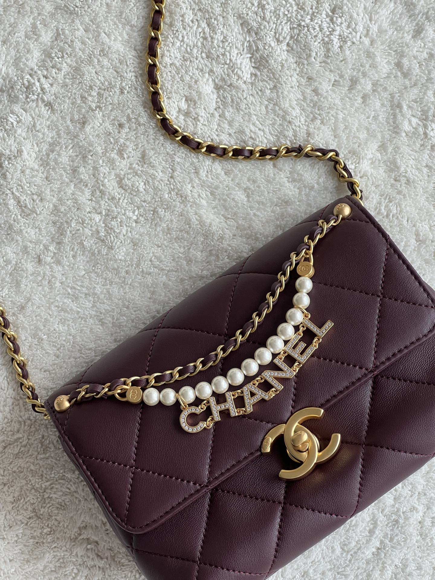 24A Mini Classic Flap Bag in Burgundy Quilted Lambskin with Pearl & Crystal CHANEL Letter Chain and Light Gold-Tone Hardware (AS4997) - Mocuir
