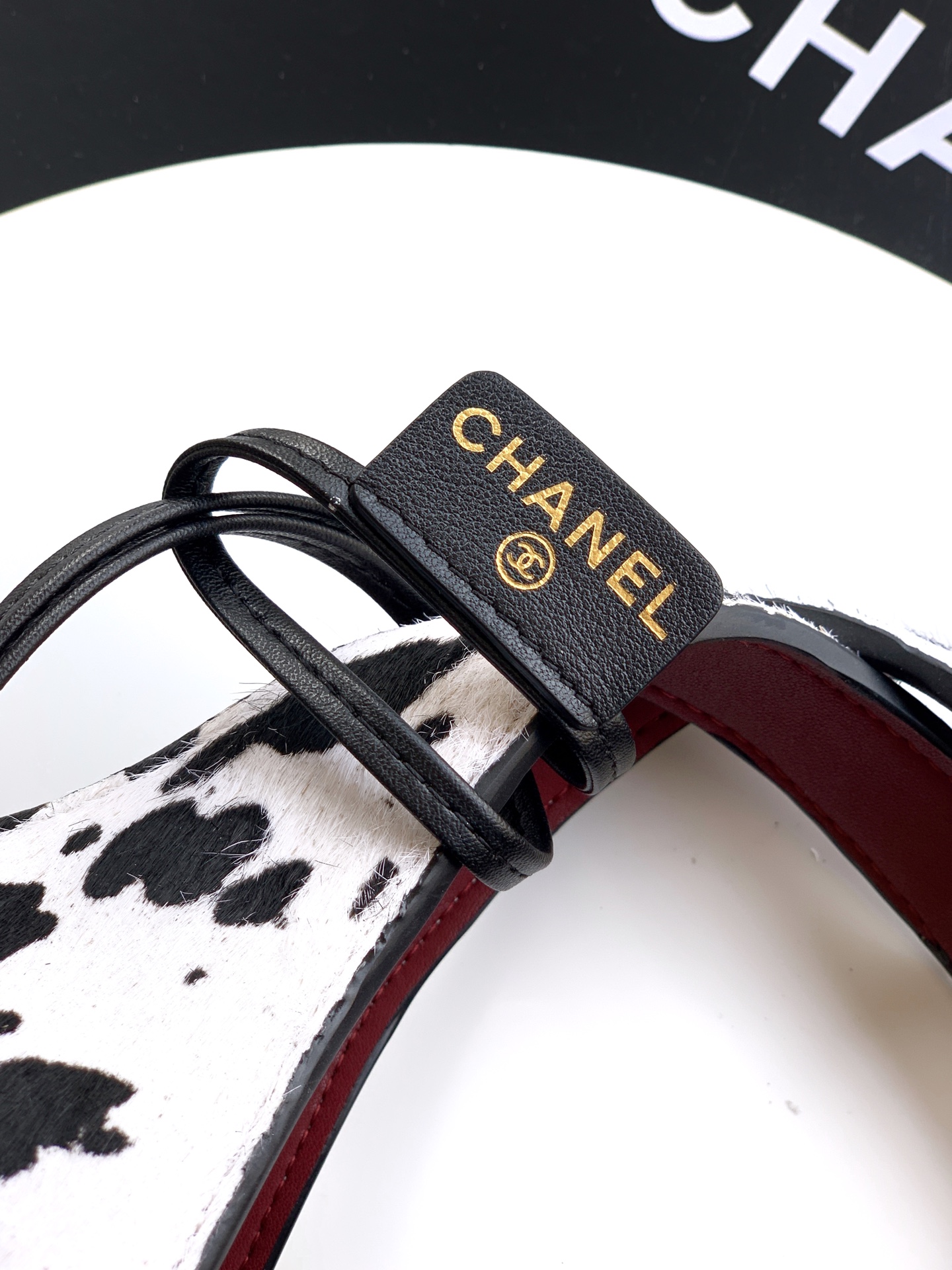 2026 Fall-Winter Runway Hobo Bag in Black & White Dalmatian Print Pony Hair with Gold-Tone Hardware & Empire State Building Tassel Charm - Mocuir