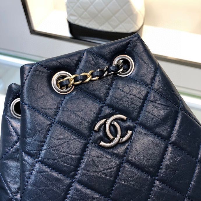 Gabrielle Small Quilted Aged Calfskin Backpack in Navy Blue & Black - Mocuir