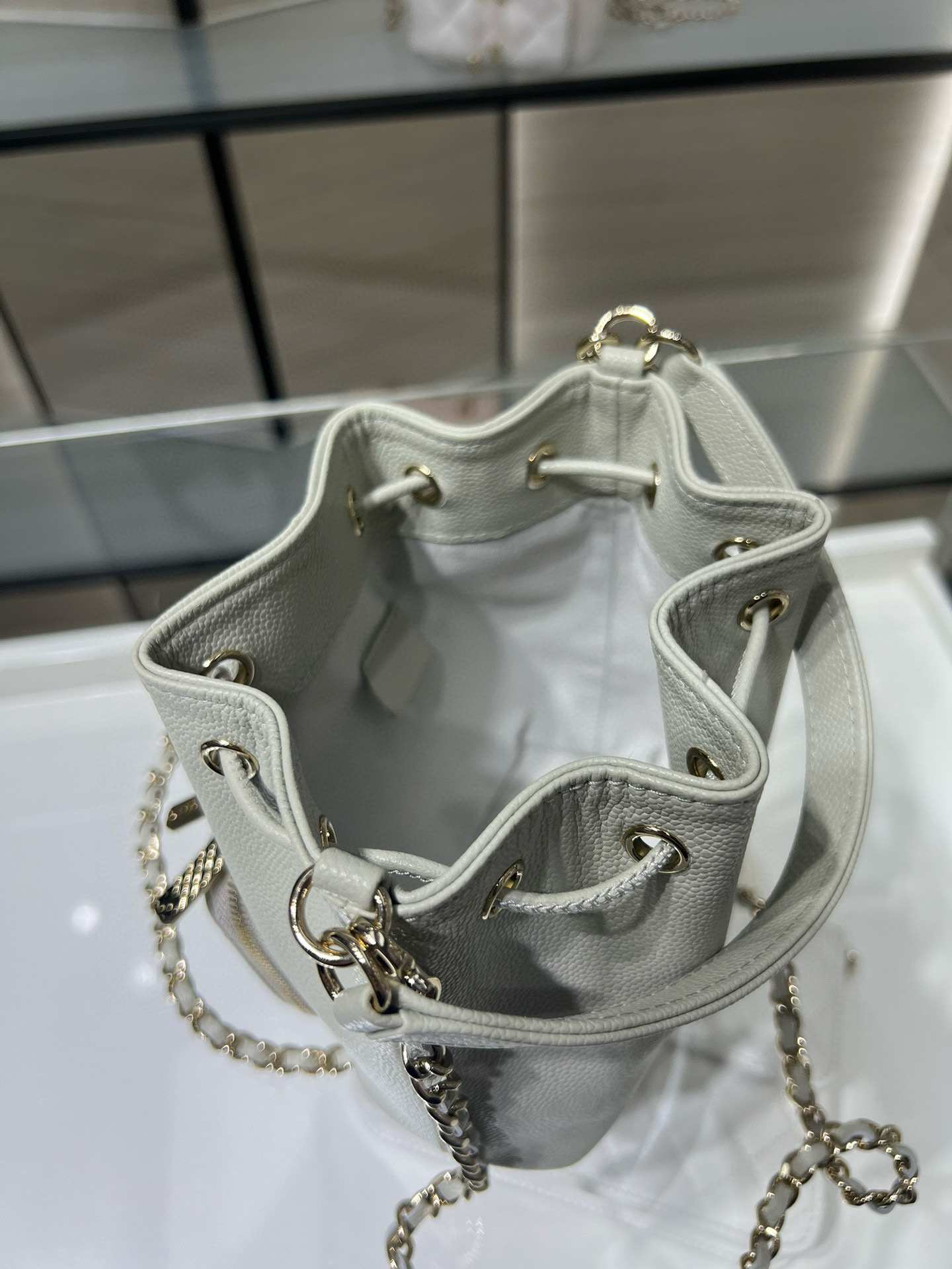 Small Drawstring Bucket Bag in Grey Quilted Grained Calfskin with Gold-Tone Metal (Model AP4775) - Mocuir