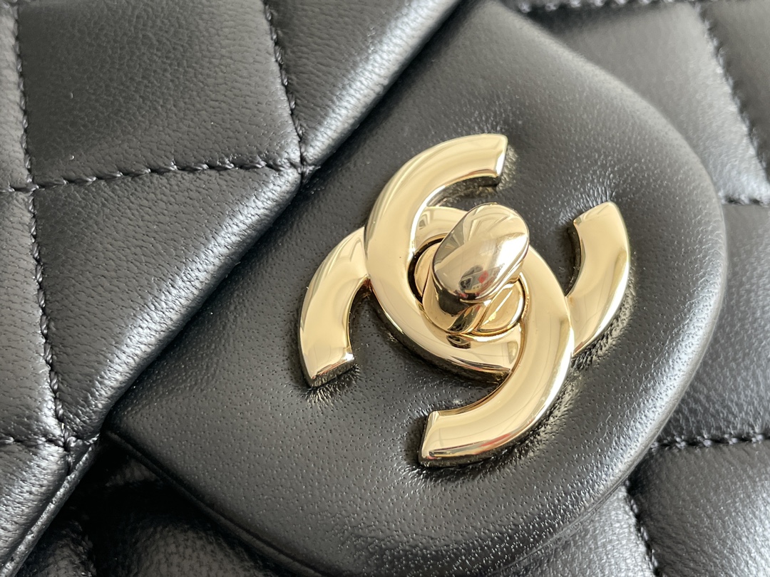 Classic Flap Mini Bag with Top Handle in Black Quilted Grained Lambskin with Gold-Tone Hardware - Mocuir