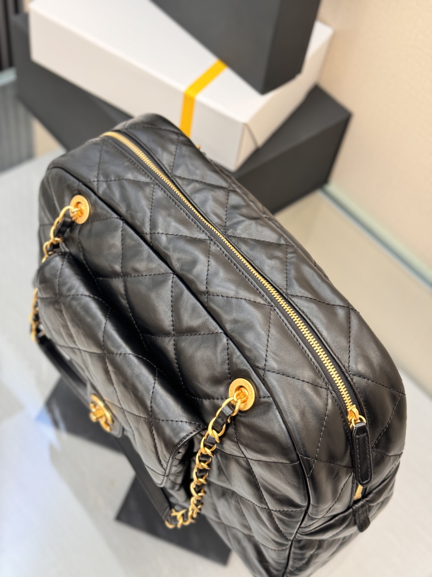 Quilted Waxed Calfskin Bowling Bag with Gold-Tone Hardware - Mocuir