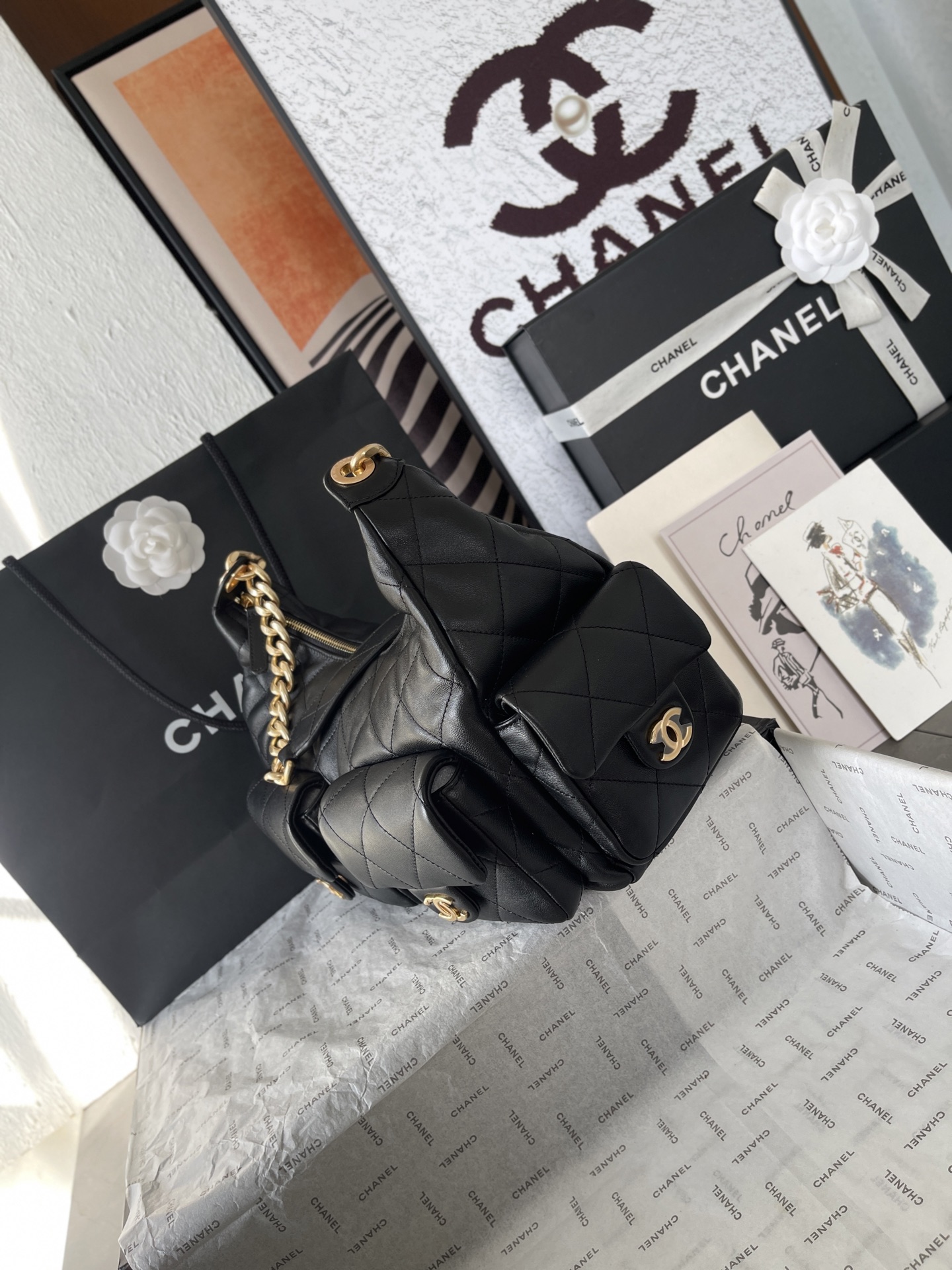 25C Multi-Pocket Hobo Bag in Black Quilted Lambskin with Gold-Tone Hardware - Mocuir