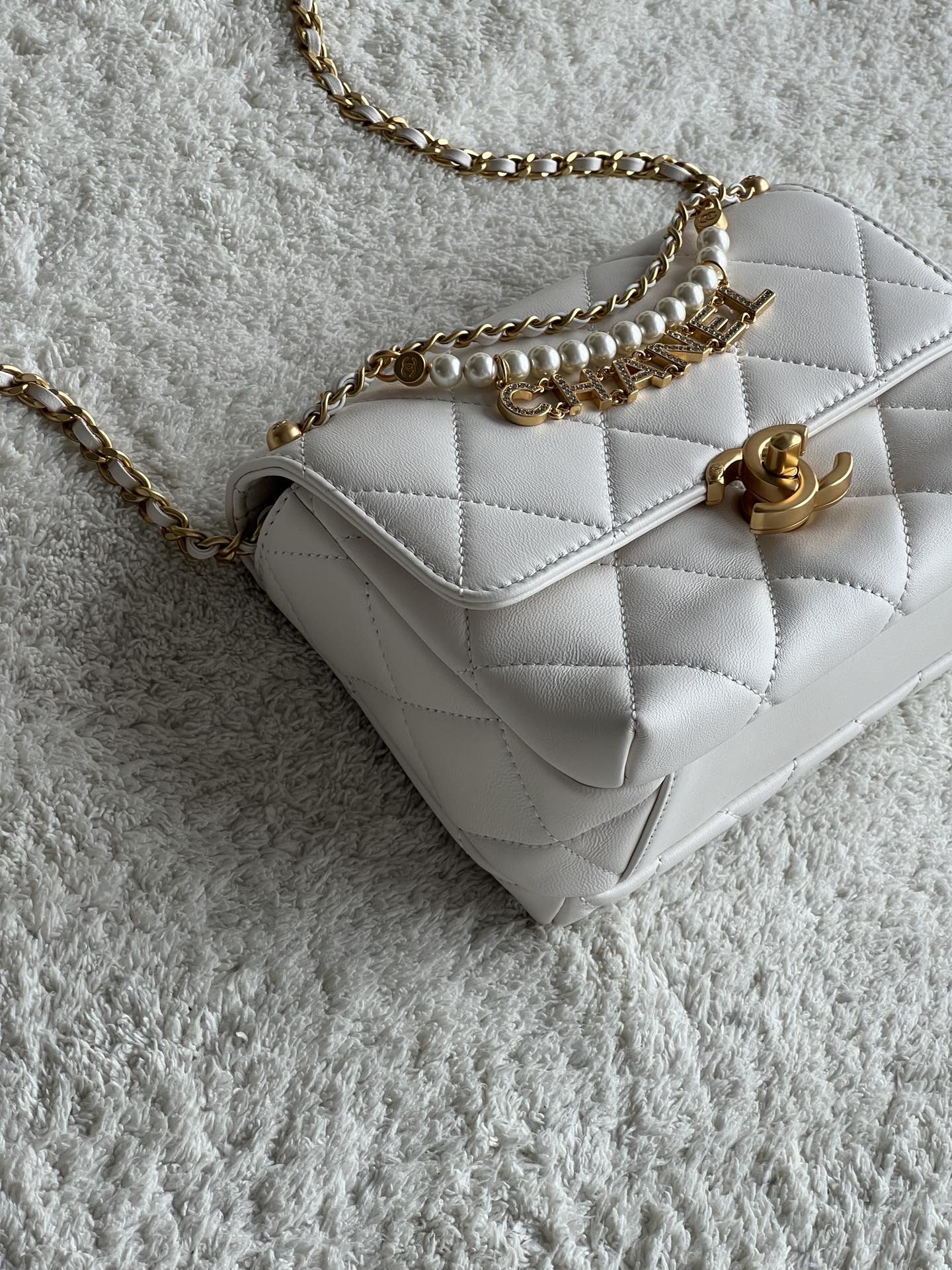 24A Mini Classic Flap Bag in White Quilted Lambskin with Pearl & Crystal CHANEL Letter Chain and Light Gold-Tone Hardware (AS4997) - Mocuir