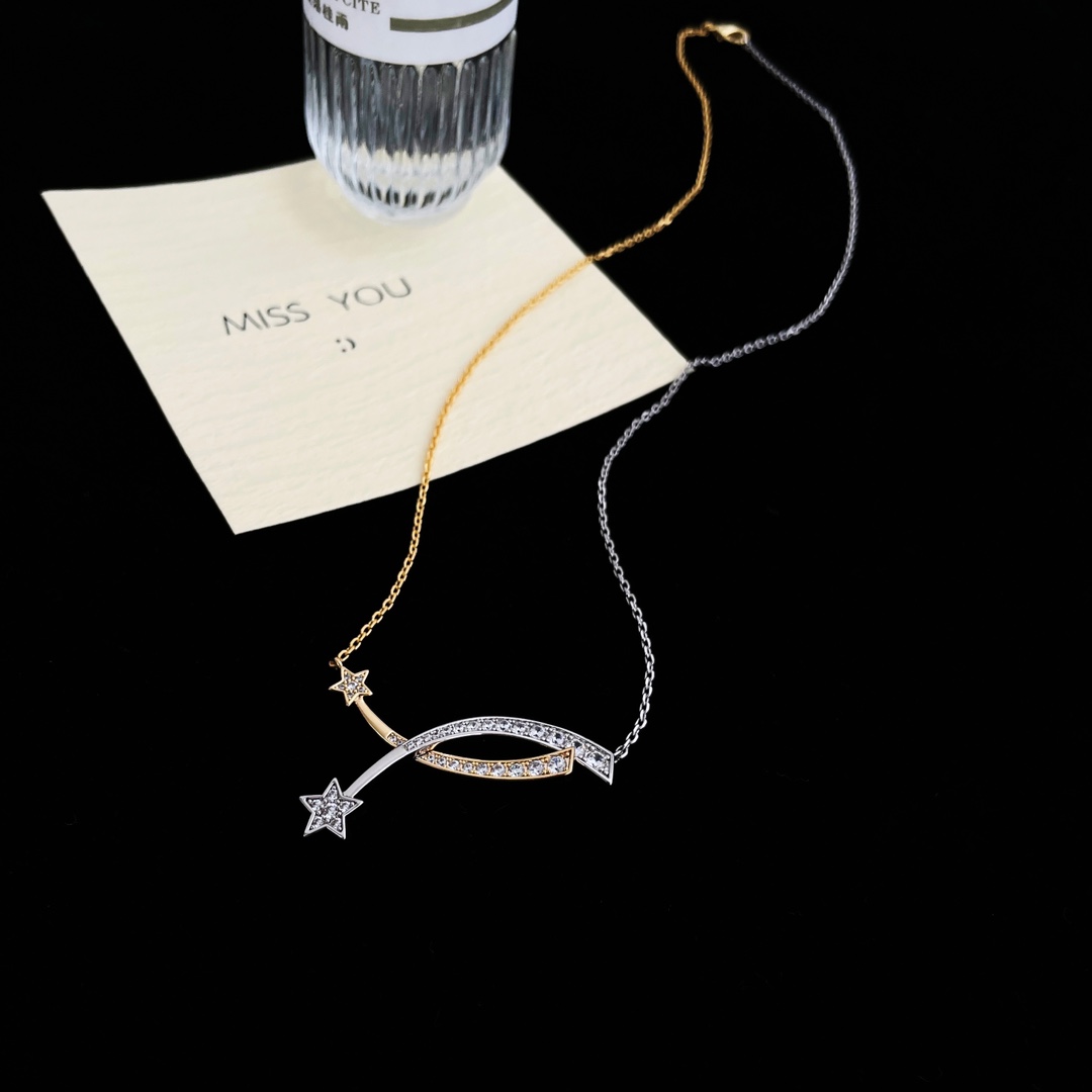 Two-tone comet necklace